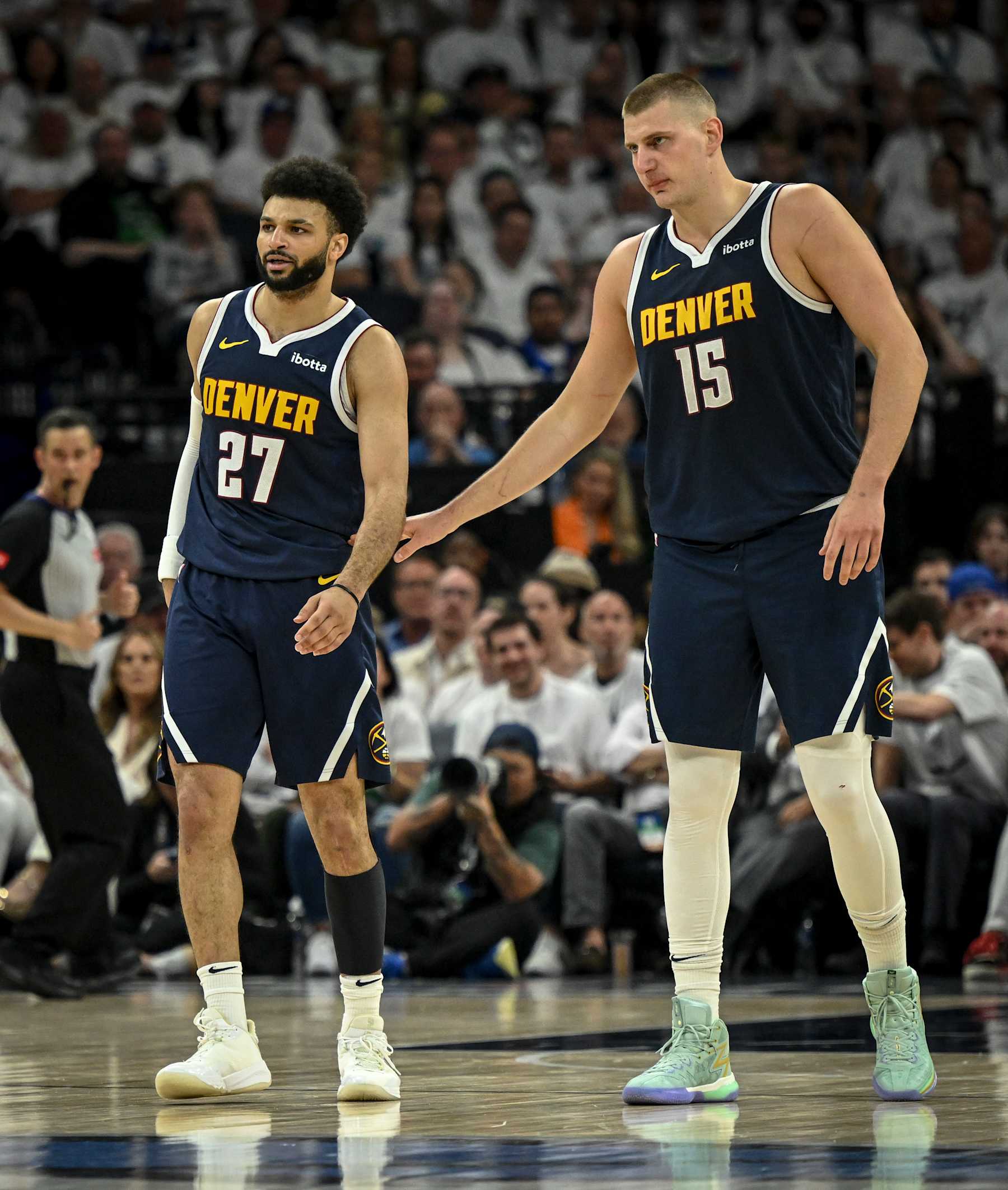 MINNEAPOLIS , MN - MAY 12: Jamal Murray (27) of the Denver Nuggets and Nikola Jokic (15) lead their squat during the second quarter against the Minnesota Timberwolves at Target Center in Minneapolis, Minnesota on Sunday, May 12, 2024. (Photo by AAron Ontiveroz/The Denver Post)