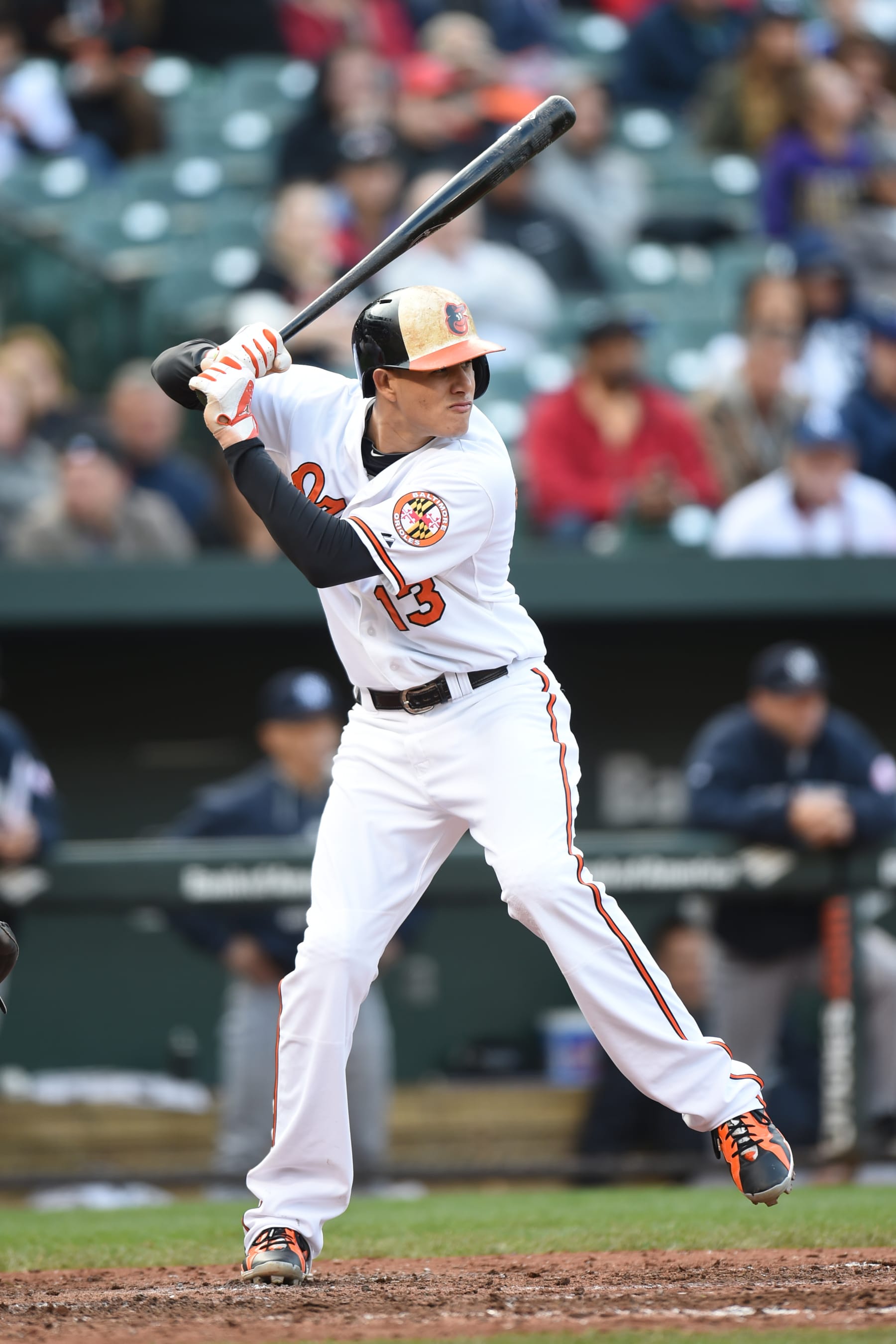 BALTIMORE, MD - OCTOBER 04:  Manny Machado #13 of the Baltimore Orioles prepares for a pitch during a baseball game against the Baltimore Orioles at Oriole Park at Camden Yards on October 4, 2015 in Baltimore, Maryland.  The Orioles won 9-4.  (Photo by Mitchell Layton/Getty Images)