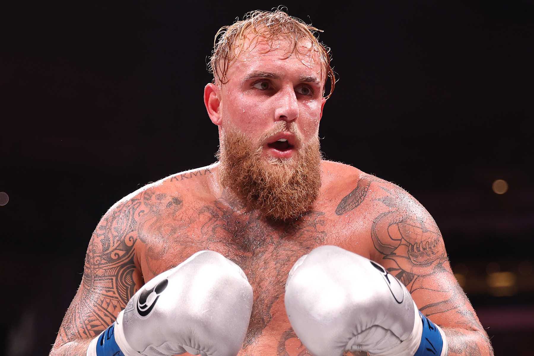 ARLINGTON, TEXAS - NOVEMBER 15: Jake Paul in action against Mike Tyson fight during LIVE On Netflix: Jake Paul vs. Mike Tyson at AT&T Stadium on November 15, 2024 in Arlington, Texas. (Photo by Al Bello/Getty Images for Netflix © 2024) ARLINGTON, TEXAS - NOVEMBER 15: Jake Paul in action against Mike Tyson fight during LIVE On Netflix: Jake Paul vs. Mike Tyson at AT&T Stadium on November 15, 2024 in Arlington, Texas. (Photo by Al Bello/Getty Images for Netflix © 2024)