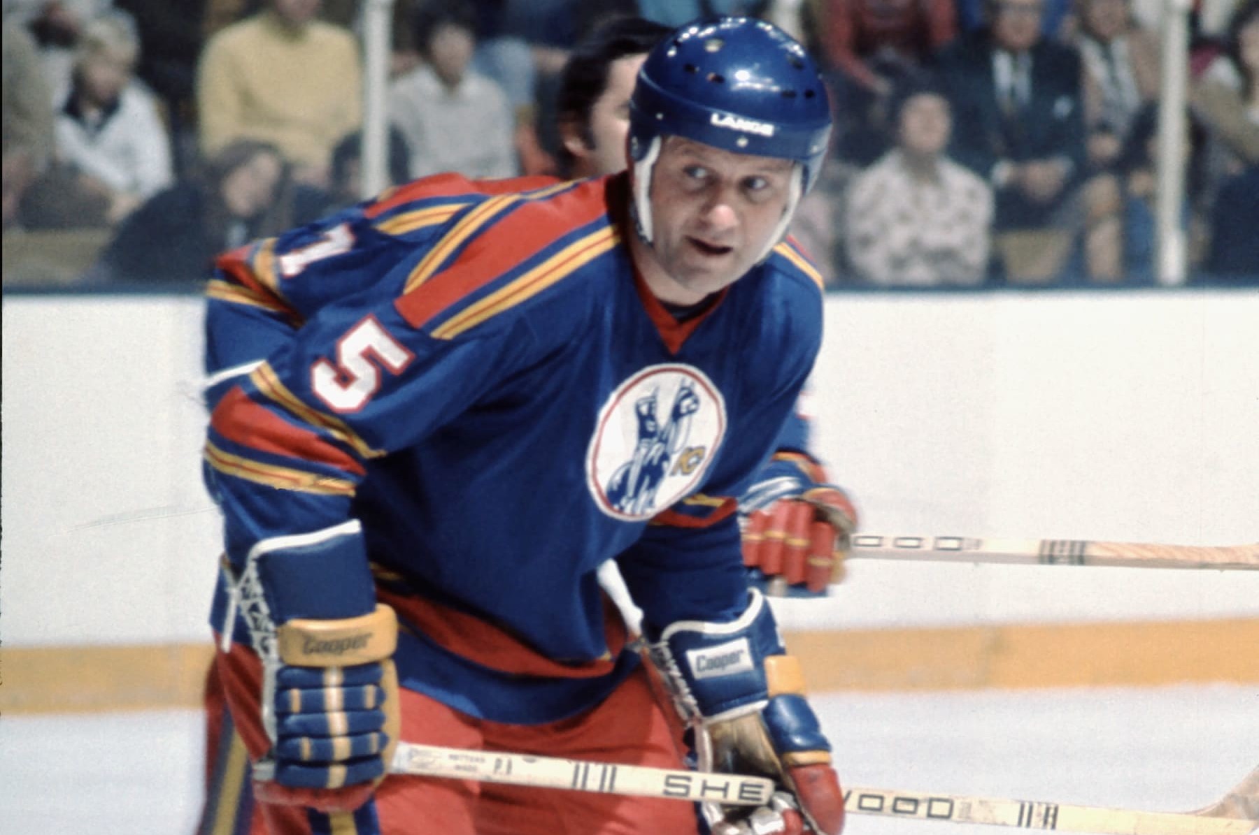 BUFFALO, NEW YORK - CIRCA 1970: Gary Bergman #5 of the Kansas CIty Scouts skates against the Buffalo Sabres circa 1970 at the Buffalo Memorial Auditorium in Buffalo, New York. (Photo by Robert Shaver/Bruce Bennett Collection/Bruce Bennett Studios via Getty Images )