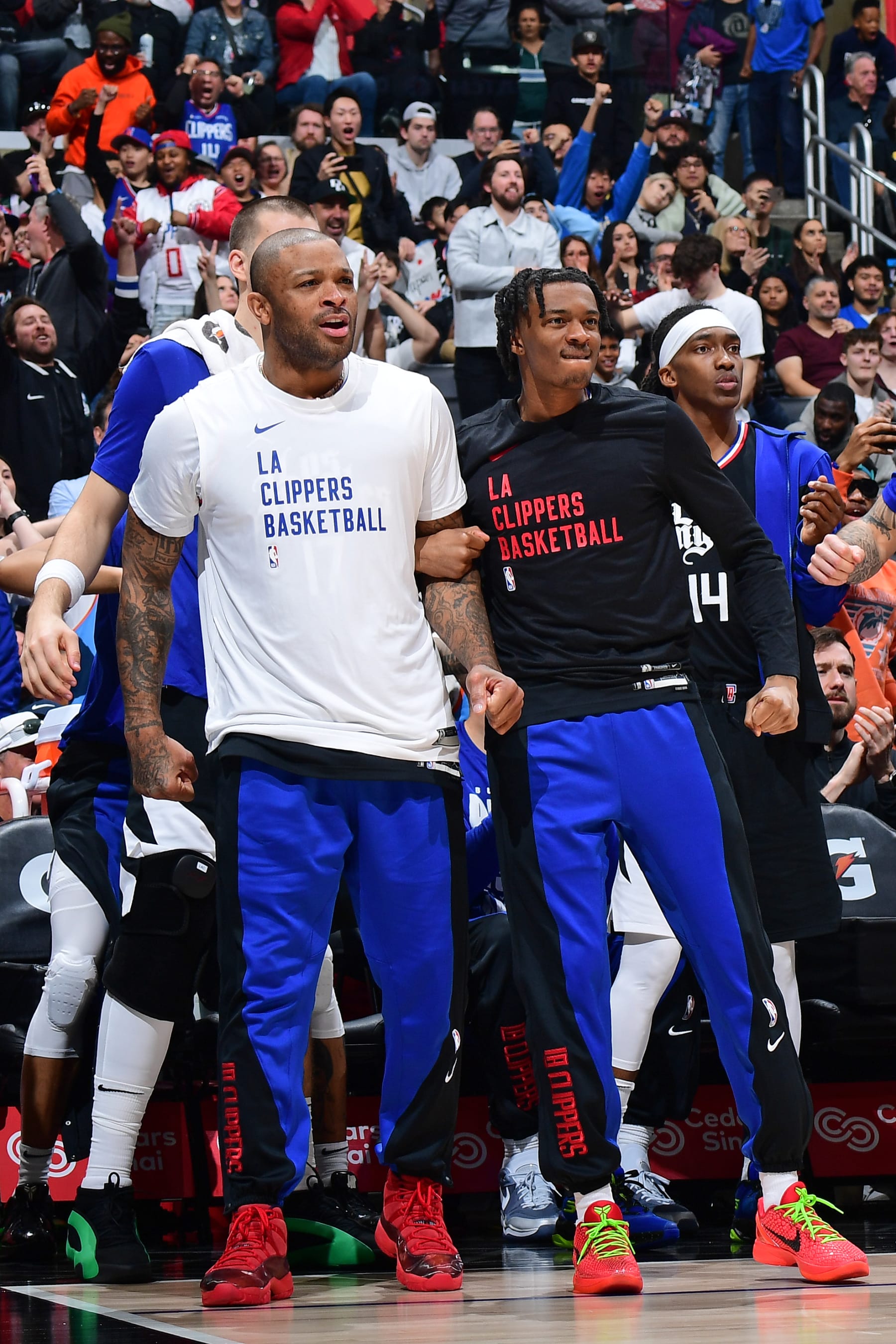 LOS ANGELES, CA - FEBRUARY 10: PJ Tucker #17 and Bones Hyland #5 of the LA Clippers celebrates during the game against the Detroit Pistons on February 10, 2024 at Crypto.Com Arena in Los Angeles, California. NOTE TO USER: User expressly acknowledges and agrees that, by downloading and/or using this Photograph, user is consenting to the terms and conditions of the Getty Images License Agreement. Mandatory Copyright Notice: Copyright 2024 NBAE (Photo by Adam Pantozzi/NBAE via Getty Images)