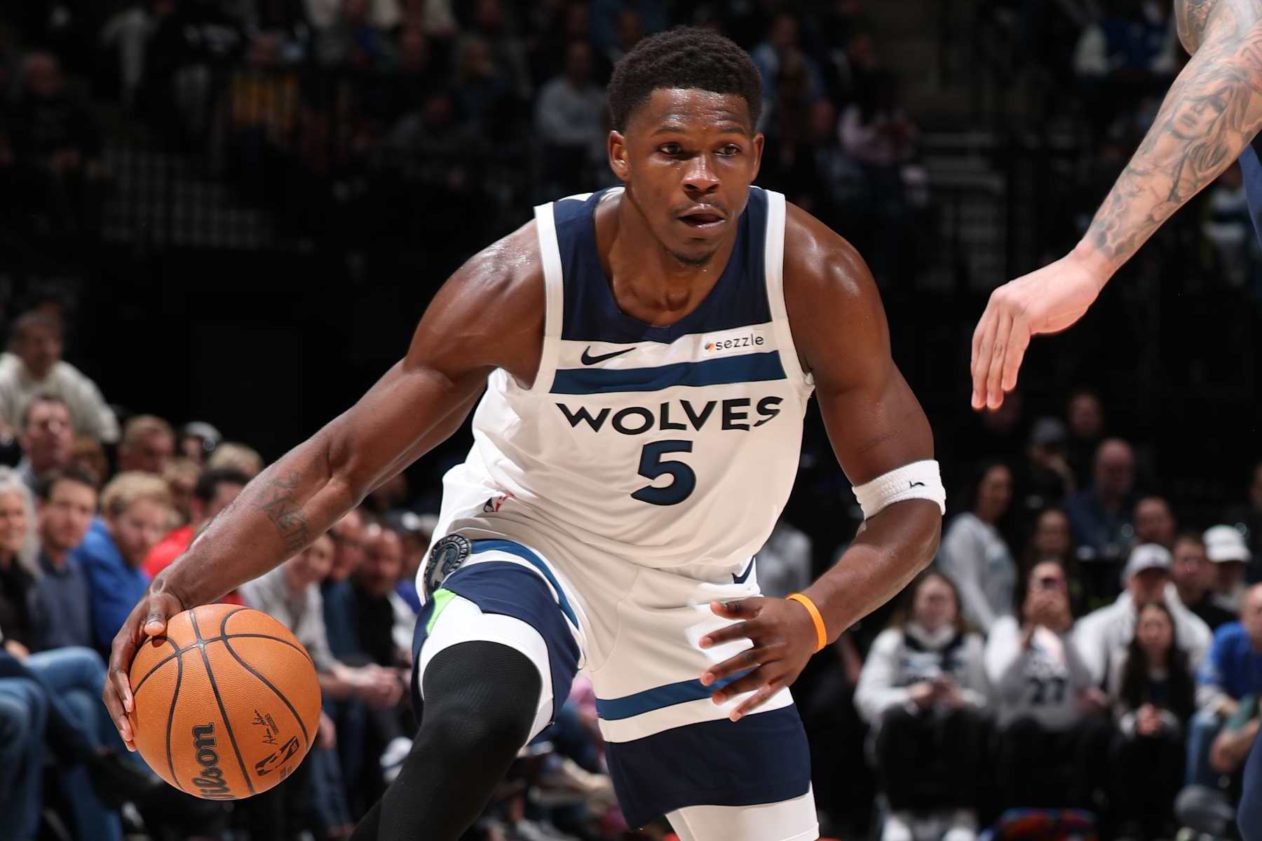MINNEAPOLIS, MN -  JANUARY 11:  Anthony Edwards #5 of the Minnesota Timberwolves handles the ball during the game against the Memphis Grizzlies on January 11, 2025 at Target Center in Minneapolis, Minnesota. NOTE TO USER: User expressly acknowledges and agrees that, by downloading and or using this Photograph, user is consenting to the terms and conditions of the Getty Images License Agreement. Mandatory Copyright Notice: Copyright 2025 NBAE (Photo by David Sherman/NBAE via Getty Images)
