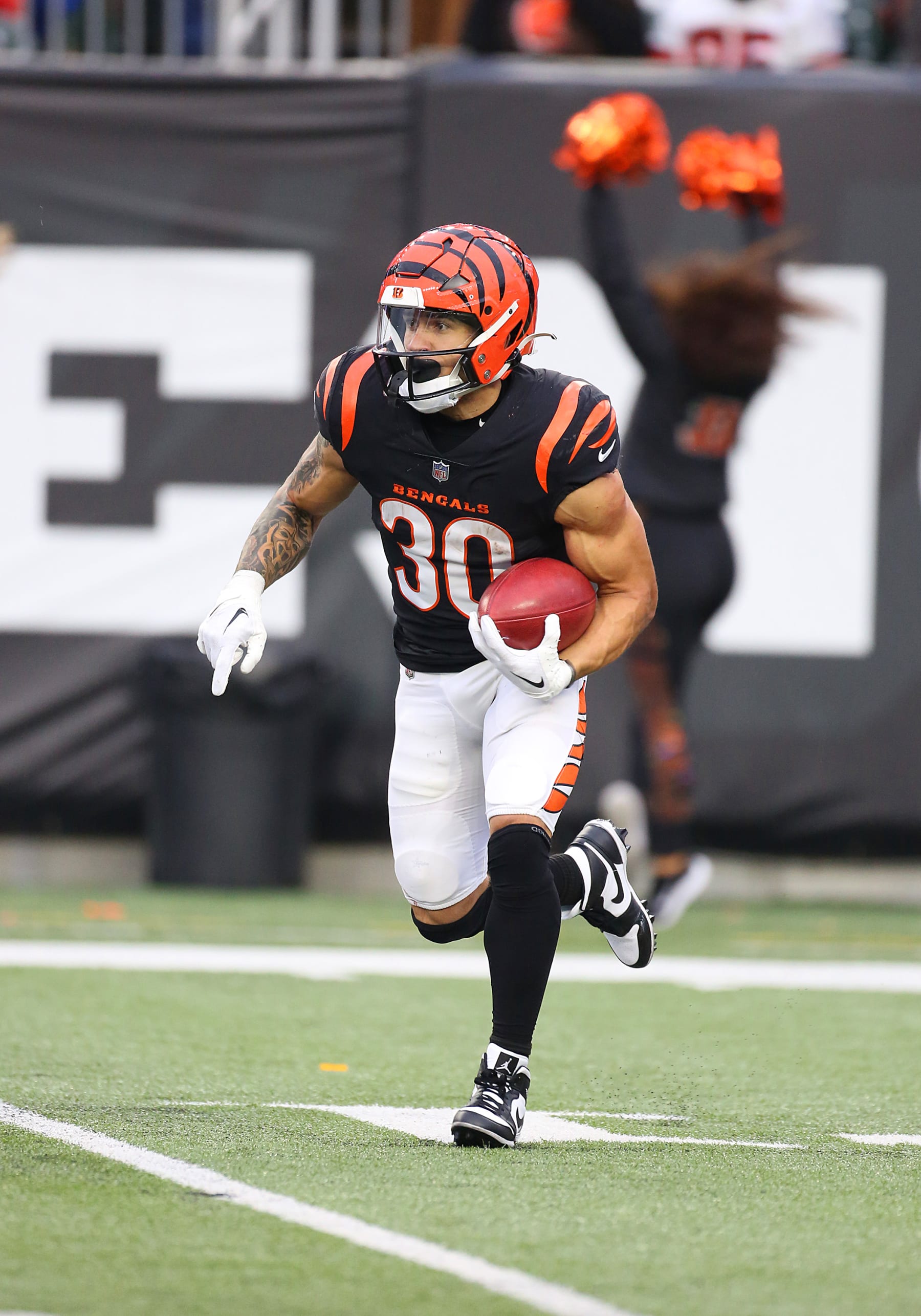 CINCINNATI, OH - JANUARY 07: Cincinnati Bengals running back Chase Brown (30) runs the ball in a game between the Cleveland Browns and the Cincinnati Bengals at Paycor Stadium on Sunday, January. 7, 2024. (Photo by Jeff Moreland/Icon Sportswire via Getty Images)