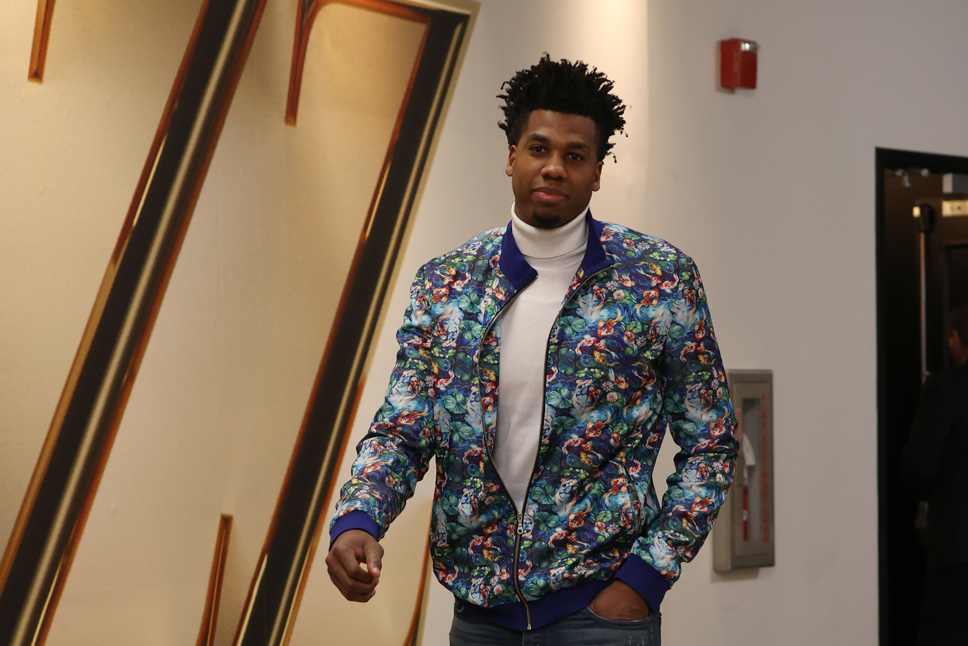 SALT LAKE CITY, UT - APRIL 21: Hassan Whiteside #21 of the Utah Jazz arrives to the arena prior to the game against the Dallas Mavericks during Round 1 Game 3 of the NBA Playoffs on April 21, 2022 at vivint.SmartHome Arena in Salt Lake City, Utah. NOTE TO USER: User expressly acknowledges and agrees that, by downloading and or using this Photograph, User is consenting to the terms and conditions of the Getty Images License Agreement. Mandatory Copyright Notice: Copyright 2022 NBAE (Photo by Melissa Majchrzak/NBAE via Getty Images) SALT LAKE CITY, UT - APRIL 21: Hassan Whiteside #21 of the Utah Jazz arrives to the arena prior to the game against the Dallas Mavericks during Round 1 Game 3 of the NBA Playoffs on April 21, 2022 at vivint.SmartHome Arena in Salt Lake City, Utah. NOTE TO USER: User expressly acknowledges and agrees that, by downloading and or using this Photograph, User is consenting to the terms and conditions of the Getty Images License Agreement. Mandatory Copyright Notice: Copyright 2022 NBAE (Photo by Melissa Majchrzak/NBAE via Getty Images)