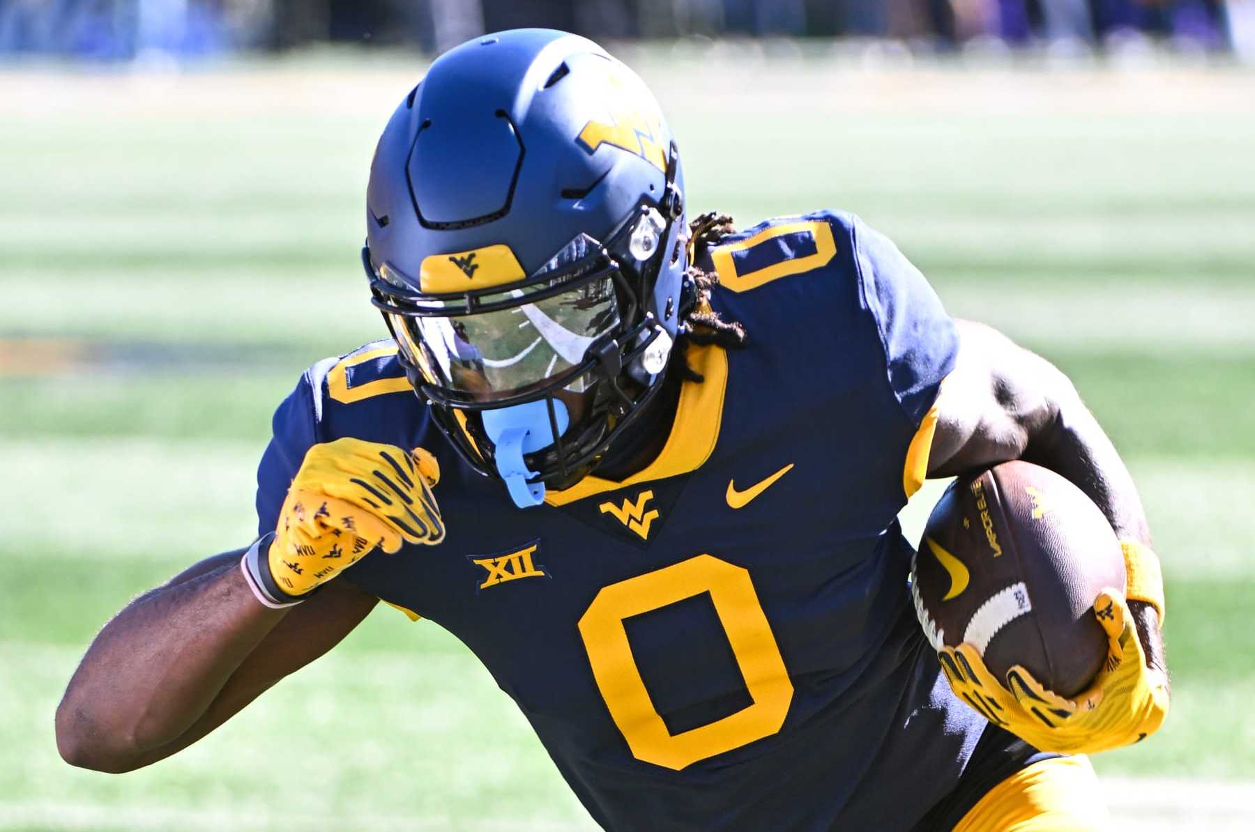 MORGANTOWN, WV - OCTOBER 29, 2022: Bryce Ford-Wheaton #0 of the West Virginia Mountaineers carries the ball during the first half against the TCU Horn Frogs at Milan Puskar Stadium on October 29, 2022 in Morgantown, West Virginia. (Photo by Chris Bernacchi/Diamond Images via Getty Images)