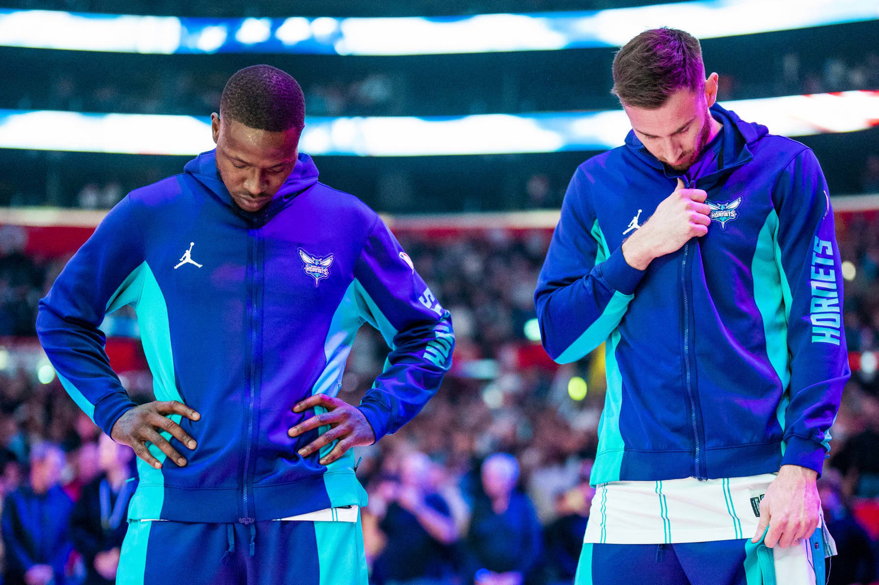 LOS ANGELES, CA - DECEMBER 26: Terry Rozier #3 and Gordon Hayward #20 of the Charlotte Hornets stands for the National Anthem before the game against the LA Clippers on December 26, 2023 at Crypto.Com Arena in Los Angeles, California. NOTE TO USER: User expressly acknowledges and agrees that, by downloading and/or using this Photograph, user is consenting to the terms and conditions of the Getty Images License Agreement. Mandatory Copyright Notice: Copyright 2023 NBAE (Photo by Tyler Ross/NBAE via Getty Images)