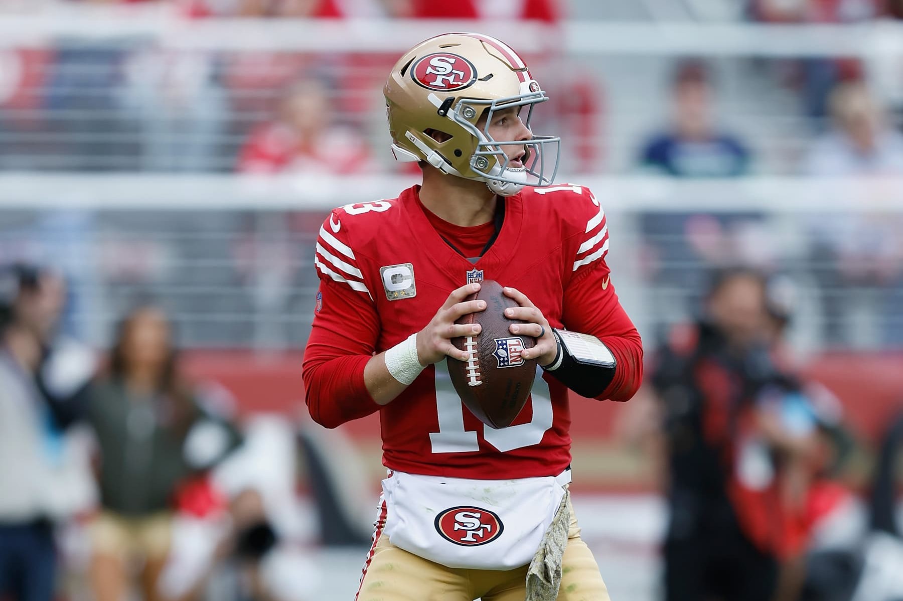 SANTA CLARA, CALIFORNIA - NOVEMBER 17: Brock Purdy #13 of the San Francisco 49ers looks to pass the ball in the second quarter against the Seattle Seahawks at Levi's Stadium on November 17, 2024 in Santa Clara, California. (Photo by Lachlan Cunningham/Getty Images)