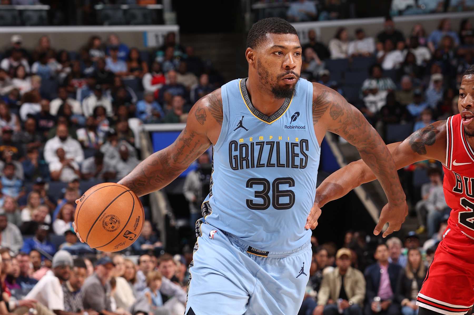MEMPHIS, TN - OCTOBER 28: Marcus Smart #36 of the Memphis Grizzlies drives to the basket during the game against the Chicago Bulls on October 28, 2024 at FedExForum in Memphis, Tennessee. NOTE TO USER: User expressly acknowledges and agrees that, by downloading and or using this photograph, User is consenting to the terms and conditions of the Getty Images License Agreement. Mandatory Copyright Notice: Copyright 2024 NBAE (Photo by Joe Murphy/NBAE via Getty Images)