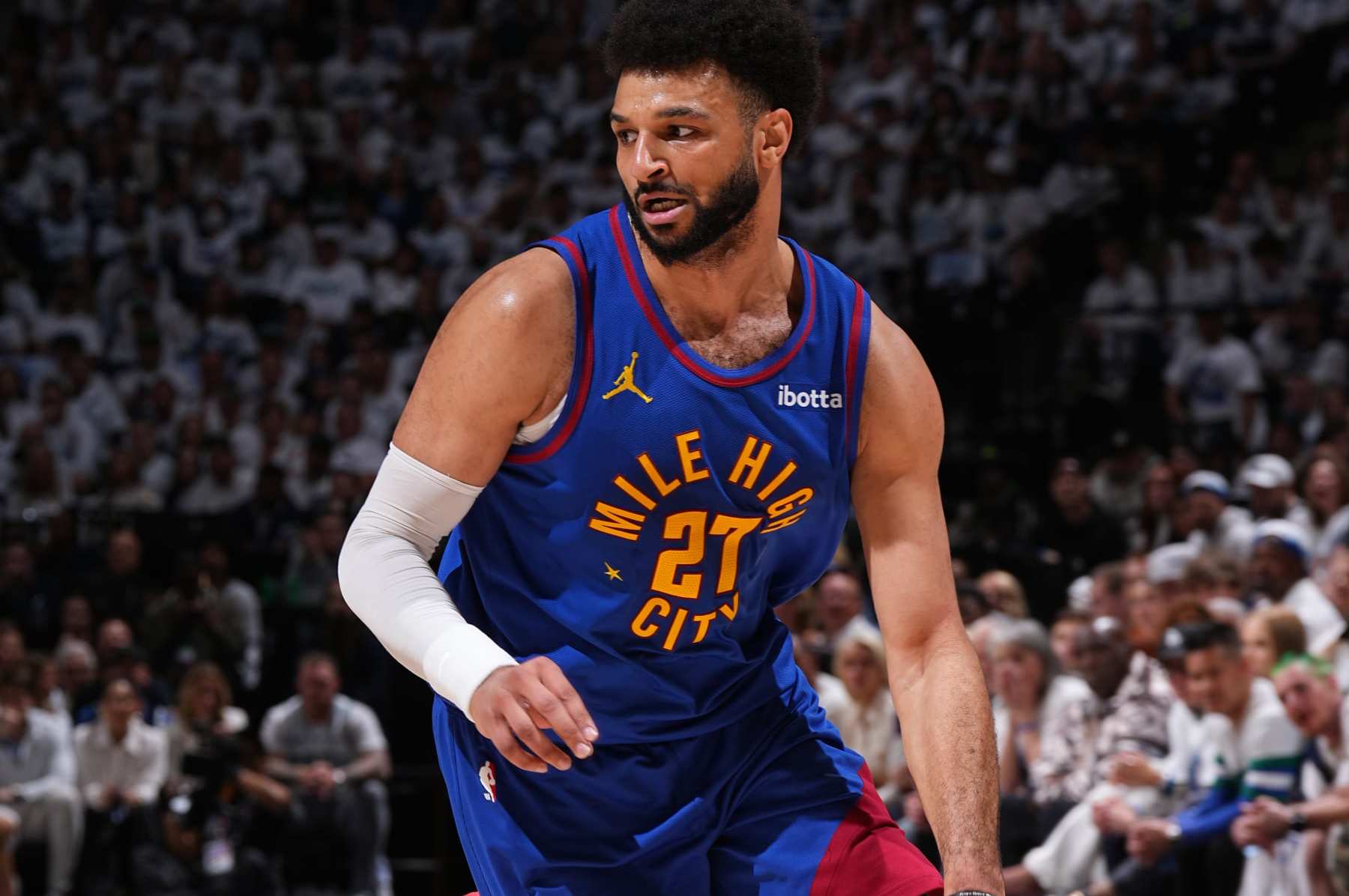 MINNEAPOLIS, MN - MAY 10: Jamal Murray #27 of the Denver Nuggets dribbles the ball during the game against the Minnesota Timberwolves during Round 2 Game 3 of the 2024 NBA Playoffs on May 10, 2024 at Target Center in Minneapolis, Minnesota. NOTE TO USER: User expressly acknowledges and agrees that, by downloading and or using this Photograph, user is consenting to the terms and conditions of the Getty Images License Agreement. Mandatory Copyright Notice: Copyright 2024 NBAE (Photo by Garrett Ellwood/NBAE via Getty Images)