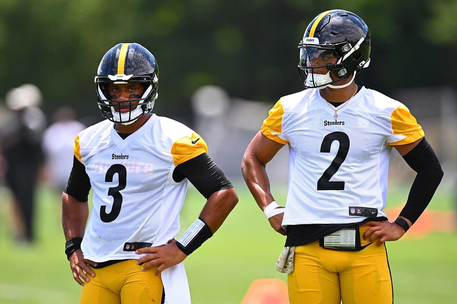 Pittsburgh Steelers quarterbacks Russell Wilson (left) and Justin Fields (right)
