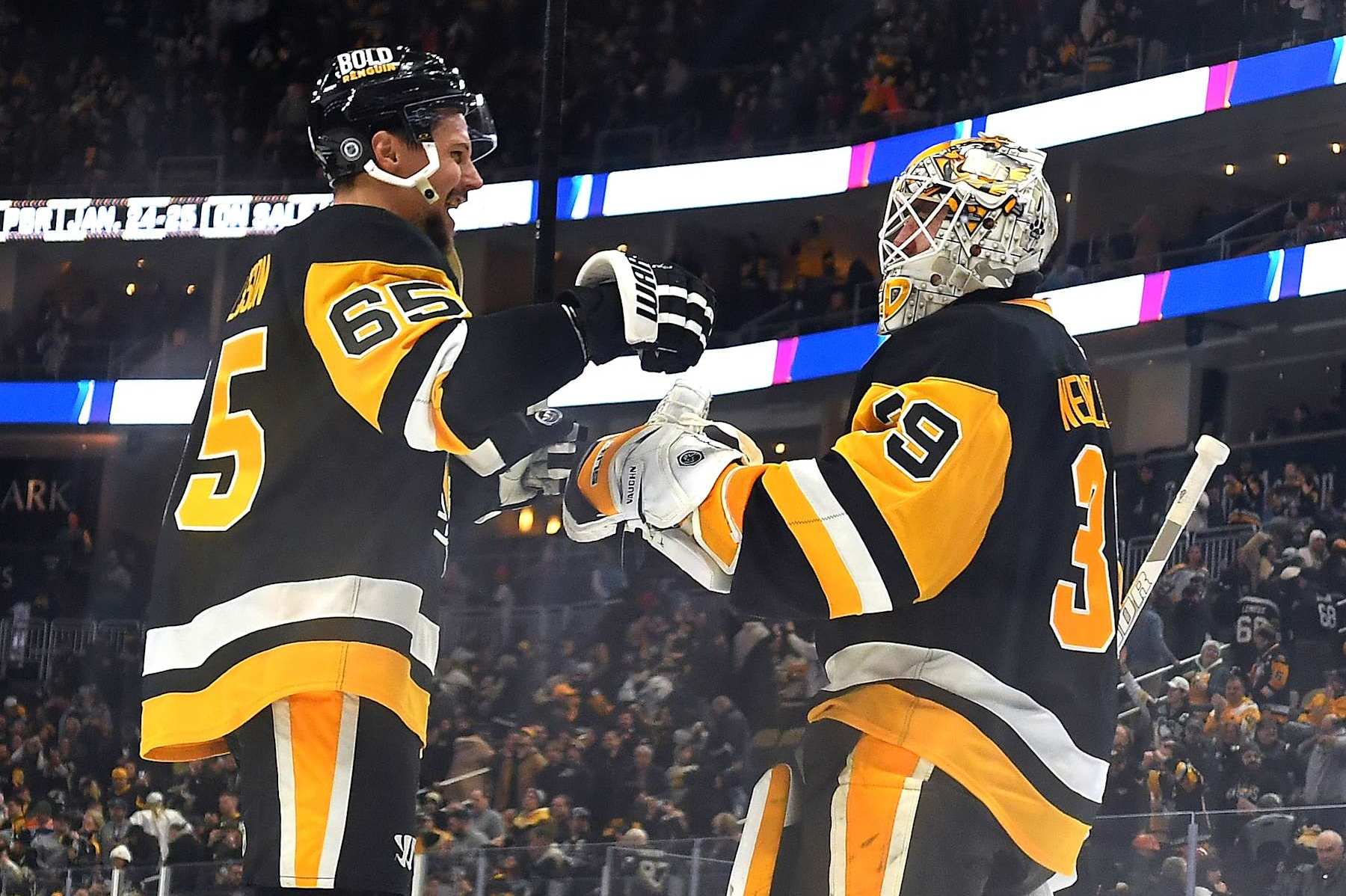 PITTSBURGH, PA - JANUARY 9: Alex Nedeljkovic #39 celebrates with Erik Karlsson #65 of the Pittsburgh Penguins after defeating the Edmonton Oilers at PPG PAINTS Arena on January 9, 2025 in Pittsburgh, Pennsylvania. (Photo by Joe Sargent/NHLI via Getty Images)