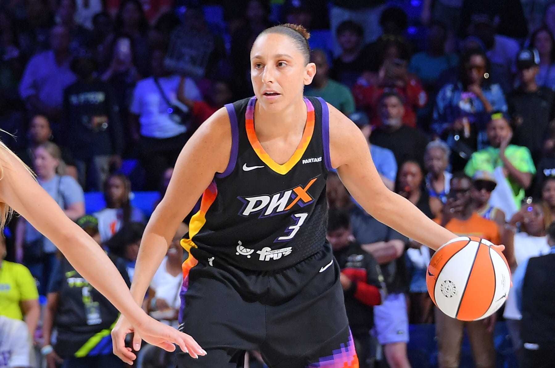 ARLINGTON, TX - JULY 3: Diana Taurasi #3 of the Phoenix Mercury handles the ball during the game against the Dallas Wings on July 3, 2024 at the College Park Center in Arlington, Texas. NOTE TO USER: User expressly acknowledges and agrees that, by downloading and or using this photograph, user is consenting to the terms and conditions of the Getty Images License Agreement. Mandatory Copyright Notice: Copyright 2024 NBAE (Photos by Michael Gonzales/NBAE via Getty Images)