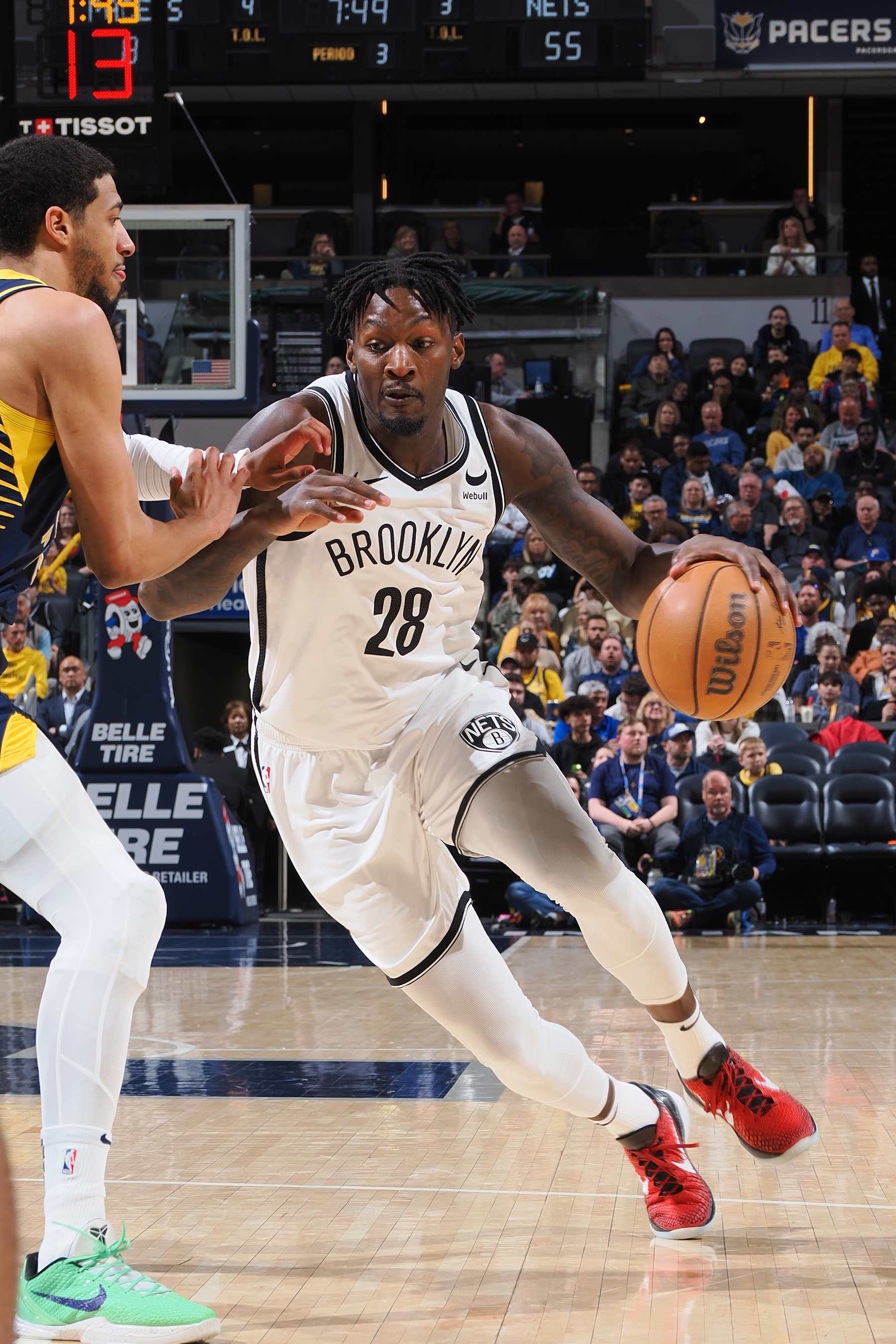 INDIANAPOLIS, IN - APRIL 1: Dorian Finney-Smith #28 of the Brooklyn Nets dribbles the ball during the game against the Indiana Pacers on April 1, 2024 at Gainbridge Fieldhouse in Indianapolis, Indiana. NOTE TO USER: User expressly acknowledges and agrees that, by downloading and or using this Photograph, user is consenting to the terms and conditions of the Getty Images License Agreement. Mandatory Copyright Notice: Copyright 2024 NBAE (Photo by Ron Hoskins/NBAE via Getty Images)