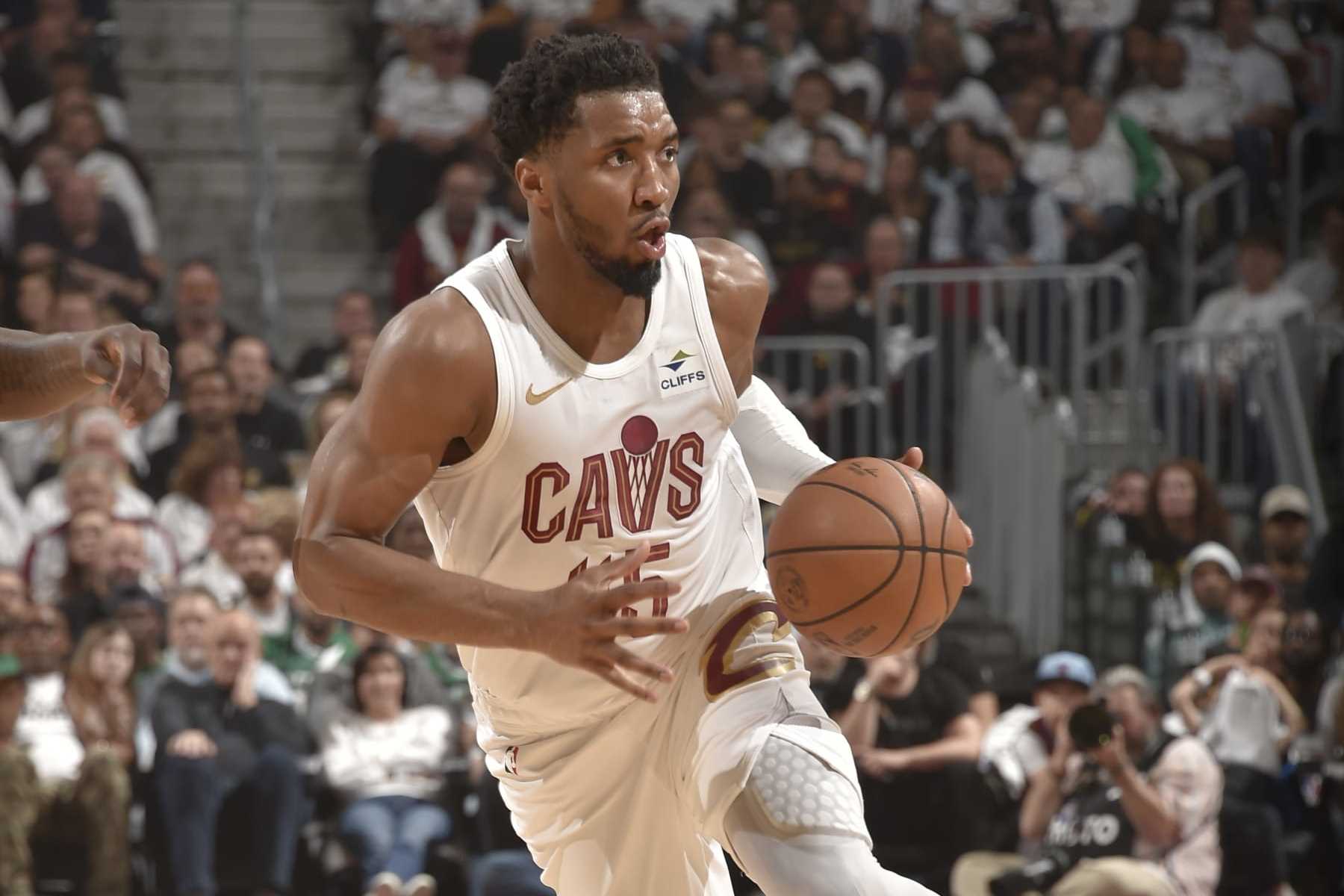 CLEVELAND, OH - MAY 11: Donovan Mitchell #45 of the Cleveland Cavaliers drives to the basket during the game  against the Boston Celtics during Round 2 Game 3 of the 2024 NBA Playoffs on May 11, 2024 at Rocket Mortgage FieldHouse in Cleveland, Ohio. NOTE TO USER: User expressly acknowledges and agrees that, by downloading and/or using this Photograph, user is consenting to the terms and conditions of the Getty Images License Agreement. Mandatory Copyright Notice: Copyright 2024 NBAE (Photo by David Liam Kyle/NBAE via Getty Images)