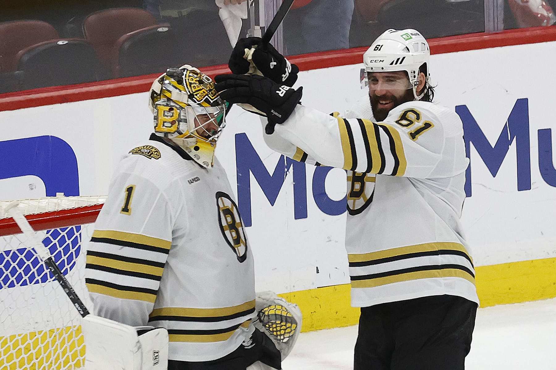 SUNRISE, FLORIDA - MAY 14: Goaltender Jeremy Swayman #1 and Pat Maroon #61 of the Boston Bruins celebrate there 2-1 win over the Florida Panthers in Game Five of the Second Round of the 2024 Stanley Cup Playoffs at the Amerant Bank Arena on May 14, 2024 in Sunrise, Florida. (Photo by Eliot J. Schechter/NHLI via Getty Images)