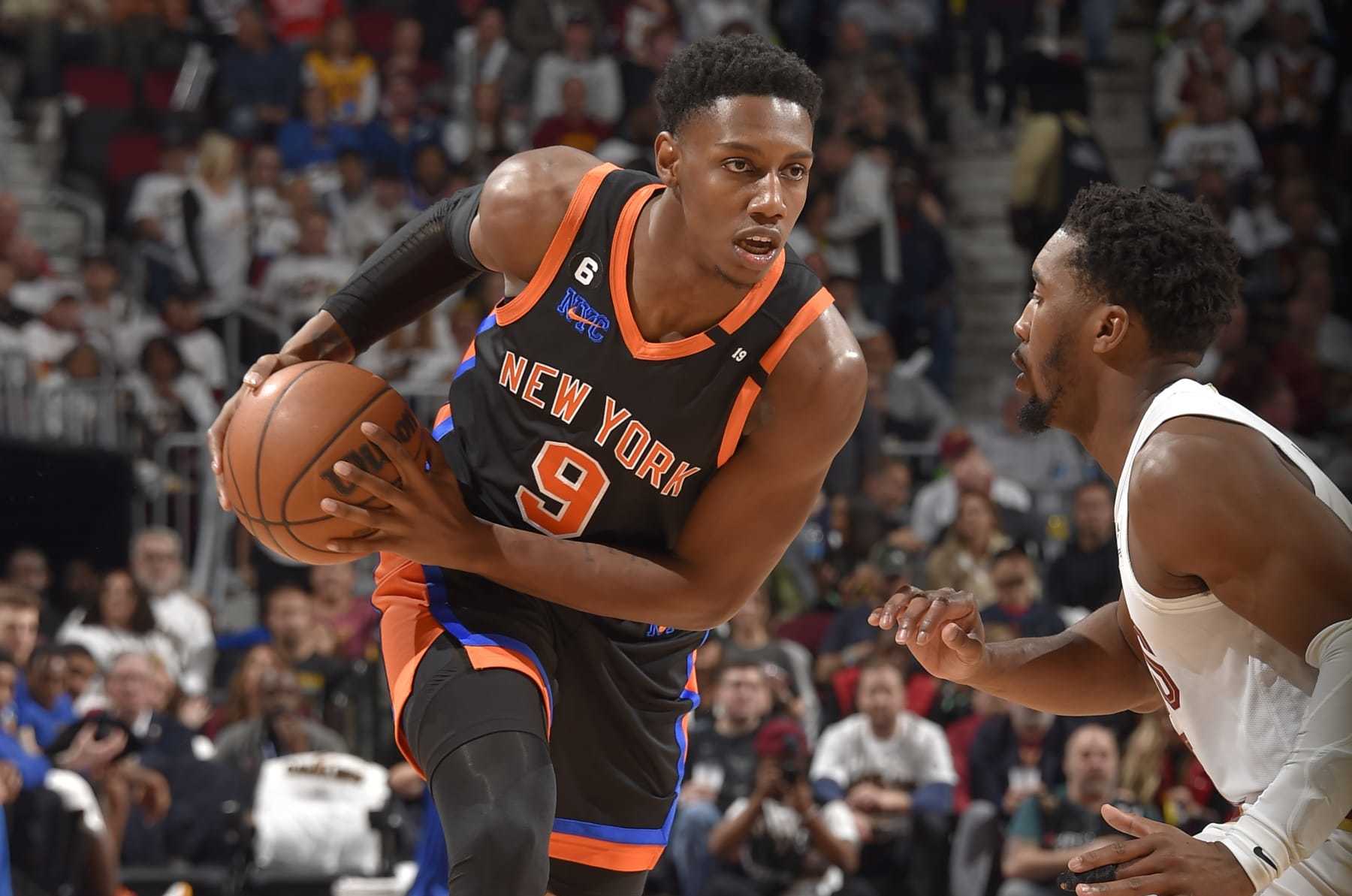 CLEVELAND, OH - APRIL 18: RJ Barrett #9 of the New York Knicks handles the ball during Round One Game Two of the 2023 NBA Playoffs against the Cleveland Cavaliers on April 18, 2023 at Rocket Mortgage FieldHouse in Cleveland, Ohio. NOTE TO USER: User expressly acknowledges and agrees that, by downloading and/or using this Photograph, user is consenting to the terms and conditions of the Getty Images License Agreement. Mandatory Copyright Notice: Copyright 2023 NBAE (Photo by David Liam Kyle/NBAE via Getty Images) CLEVELAND, OH - APRIL 18: RJ Barrett #9 of the New York Knicks handles the ball during Round One Game Two of the 2023 NBA Playoffs against the Cleveland Cavaliers on April 18, 2023 at Rocket Mortgage FieldHouse in Cleveland, Ohio. NOTE TO USER: User expressly acknowledges and agrees that, by downloading and/or using this Photograph, user is consenting to the terms and conditions of the Getty Images License Agreement. Mandatory Copyright Notice: Copyright 2023 NBAE (Photo by David Liam Kyle/NBAE via Getty Images)