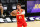 ATLANTA, GA - NOVEMBER 9: Trae Young #11 of the Atlanta Hawks passes the ball against the Utah Jazz on November 9, 2022 at State Farm Arena in Atlanta, Georgia.  NOTE TO USER: User expressly acknowledges and agrees that, by downloading and/or using this Photograph, user is consenting to the terms and conditions of the Getty Images License Agreement. Mandatory Copyright Notice: Copyright 2022 NBAE (Photo by Scott Cunningham/NBAE via Getty Images)