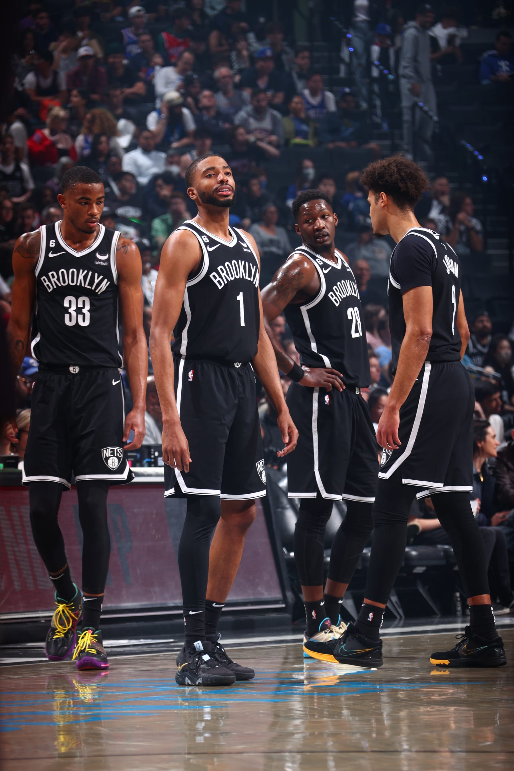 BROOKLYN, NY - APRIL 22: Nicolas Claxton #33, Mikal Bridges #1, Dorian Finney-Smith #28 and Cameron Johnson #2 of the Brooklyn Nets gaze on at some level of the game in opposition to the Philadelphia 76ers at some level of Spherical 1 Game 4 of the 2023 NBA Playoffs on April 22, 2023 at Barclays Heart in Brooklyn, Original York. NOTE TO USER: Particular person expressly acknowledges and concurs that, by downloading and or the use of this Photo, user is consenting to the terms and conditions of the Getty Pictures License Settlement. Significant Copyright Look: Copyright 2023 NBAE (Photo by Nathaniel S. Butler/NBAE by Getty Pictures)