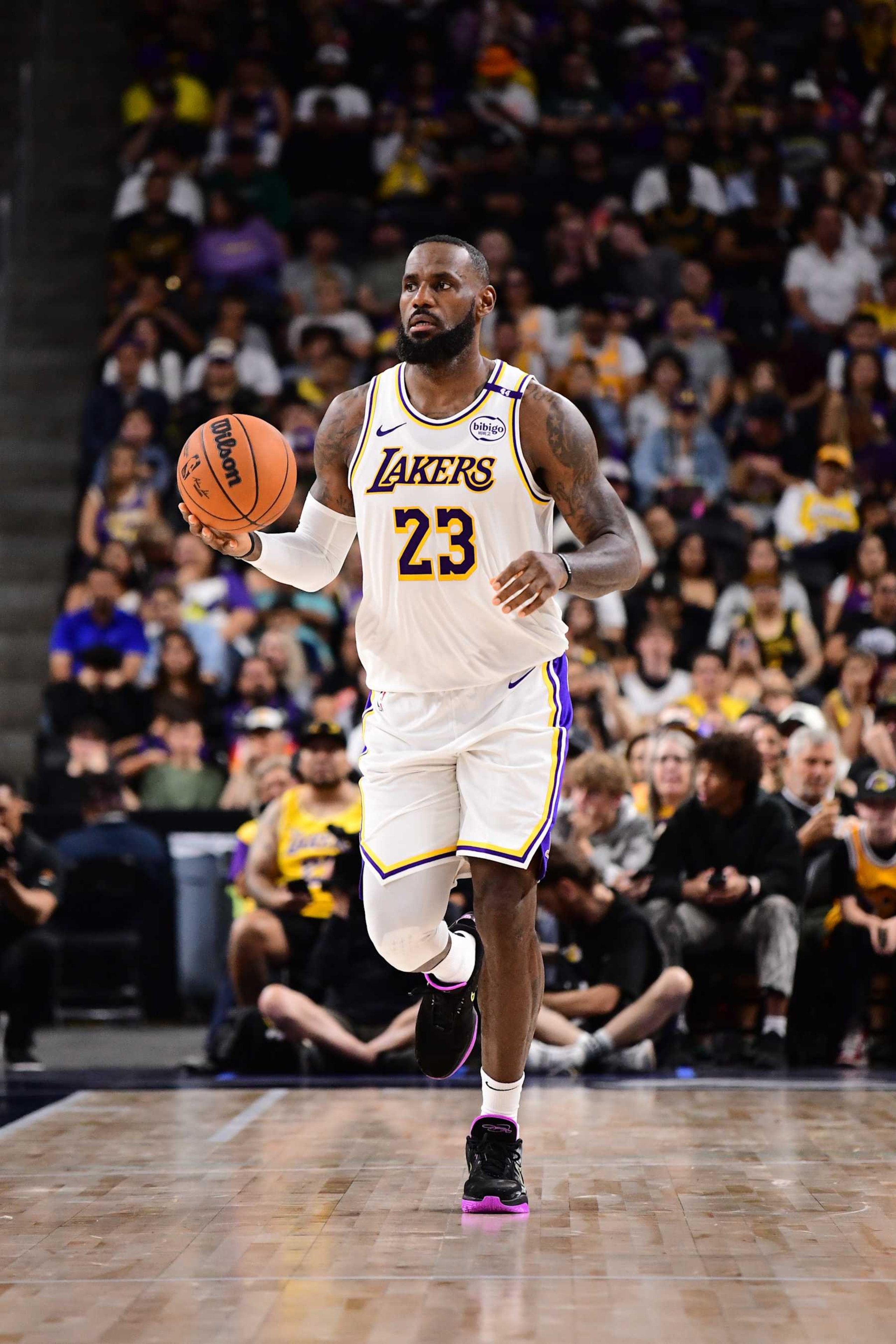 LOS ANGELES, CA - OCTOBER 6: LeBron James #23 of the Los Angeles Lakers dribbles the ball during the game against the Phoenix Suns on October 6, 2024 at Acrisure Arena in Palm Springs, California. NOTE TO USER: User expressly acknowledges and agrees that, by downloading and/or using this Photograph, user is consenting to the terms and conditions of the Getty Images License Agreement. Mandatory Copyright Notice: Copyright 2024 NBAE (Photo by Adam Pantozzi/NBAE via Getty Images)
