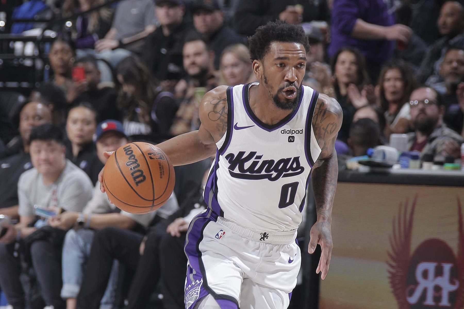 SACRAMENTO, CA - MARCH 29: Malik Monk #0 of the Sacramento Kings brings the ball up the court during the game against the Dallas Mavericks on March 29, 2024 at Golden 1 Center in Sacramento, California. NOTE TO USER: User expressly acknowledges and agrees that, by downloading and or using this photograph, User is consenting to the terms and conditions of the Getty Images Agreement. Mandatory Copyright Notice: Copyright 2024 NBAE (Photo by Rocky Widner/NBAE via Getty Images)