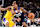PALM SPRINGS, CA - OCTOBER 4: Rob Dillingham #4 of the Minnesota Timberwolves drives to the basket during the game against the Los Angeles Lakers during an NBA preseason game on October 4, 2024 at Acrisure Arena in Palm Springs, California. NOTE TO USER: User expressly acknowledges and agrees that, by downloading and/or using this Photograph, user is consenting to the terms and conditions of the Getty Images License Agreement. Mandatory Copyright Notice: Copyright 2024 NBAE (Photo by Adam Pantozzi/NBAE via Getty Images)
