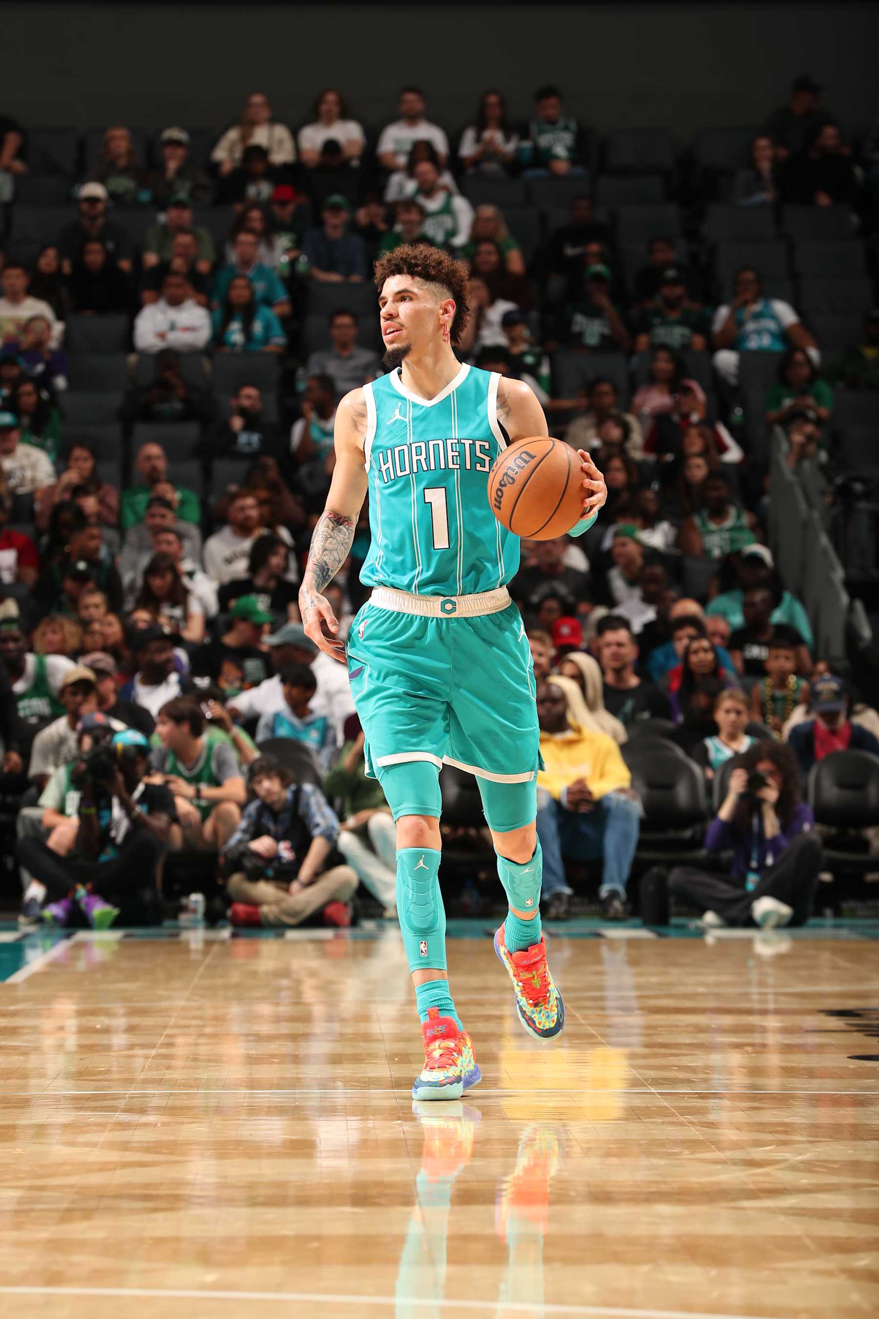CHARLOTTE, NC - NOVEMBER 1:  LaMelo Ball #1 of the Charlotte Hornets dribbles the ball during the game against the Boston Celtics on November  1, 2024 at Spectrum Center in Charlotte, North Carolina. NOTE TO USER: User expressly acknowledges and agrees that, by downloading and or using this photograph, User is consenting to the terms and conditions of the Getty Images License Agreement. Mandatory Copyright Notice: Copyright 2024 NBAE (Photo by Kent Smith/NBAE via Getty Images)