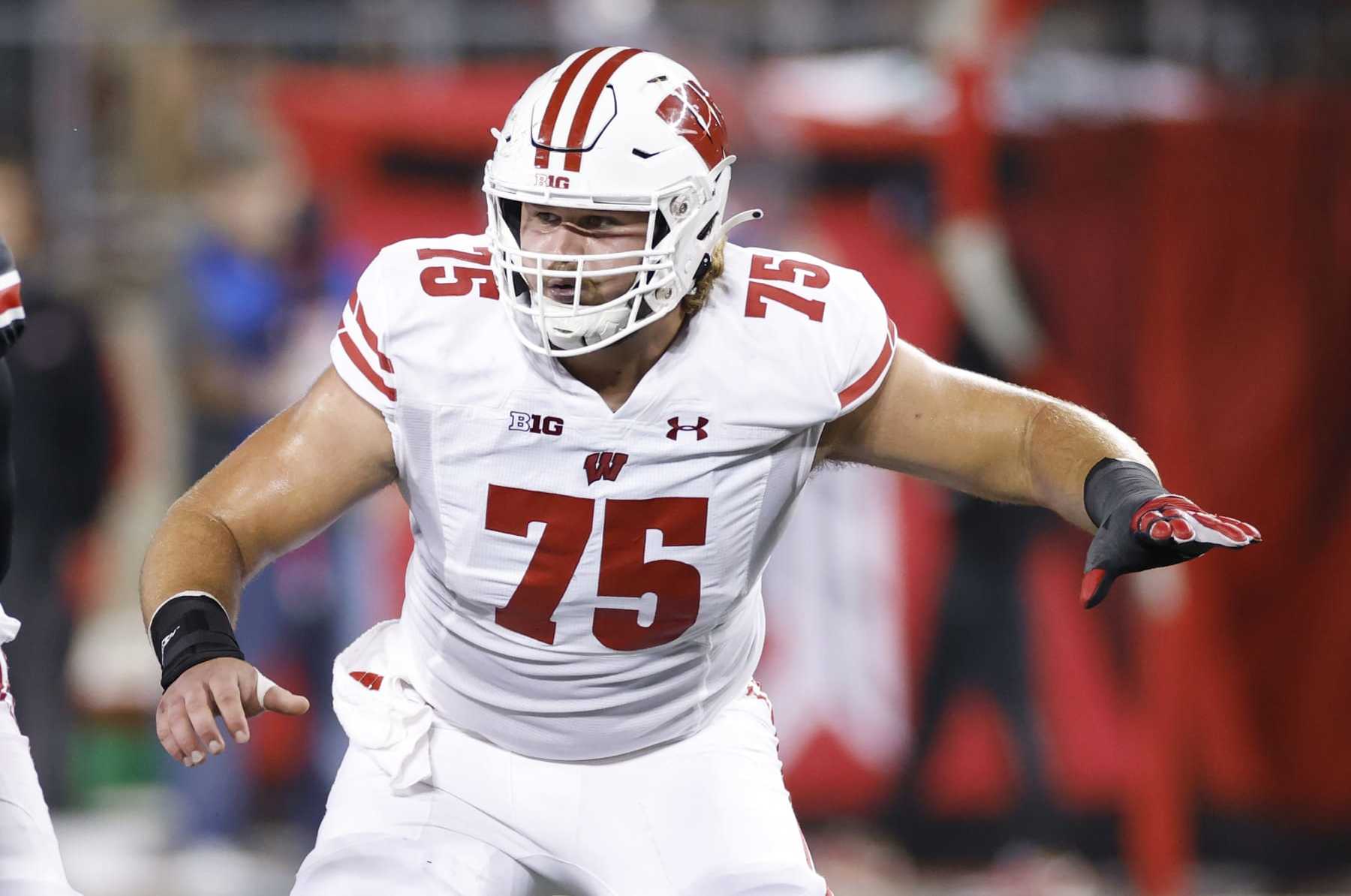 COLUMBUS, OH - SEPTEMBER 24: Wisconsin Badgers offensive lineman Joe Tippmann (75) blocks during a college football game against the Ohio State Buckeyes on September 24, 2022 at Ohio Stadium in Columbus, Ohio. (Photo by Joe Robbins/Icon Sportswire via Getty Images)