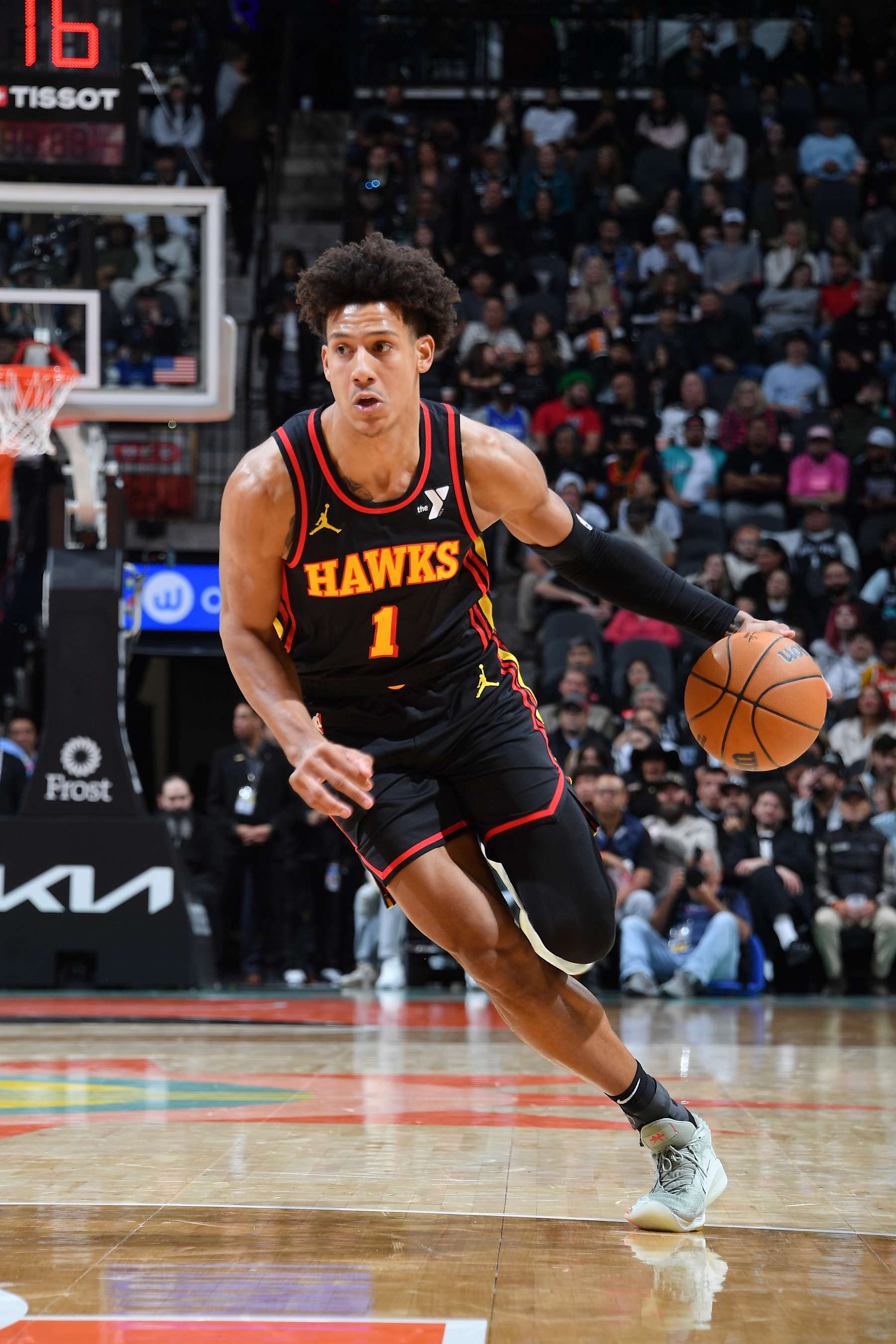 SAN ANTONIO, TX - DECEMBER 19: Jalen Johnson #1 of the Atlanta Hawks handles the ball during the game against the San Antonio Spurs on December 19, 2024 at the Frost Bank Center in San Antonio, Texas. NOTE TO USER: User expressly acknowledges and agrees that, by downloading and or using this photograph, user is consenting to the terms and conditions of the Getty Images License Agreement. Mandatory Copyright Notice: Copyright 2024 NBAE (Photos by Michael Gonzales/NBAE via Getty Images)