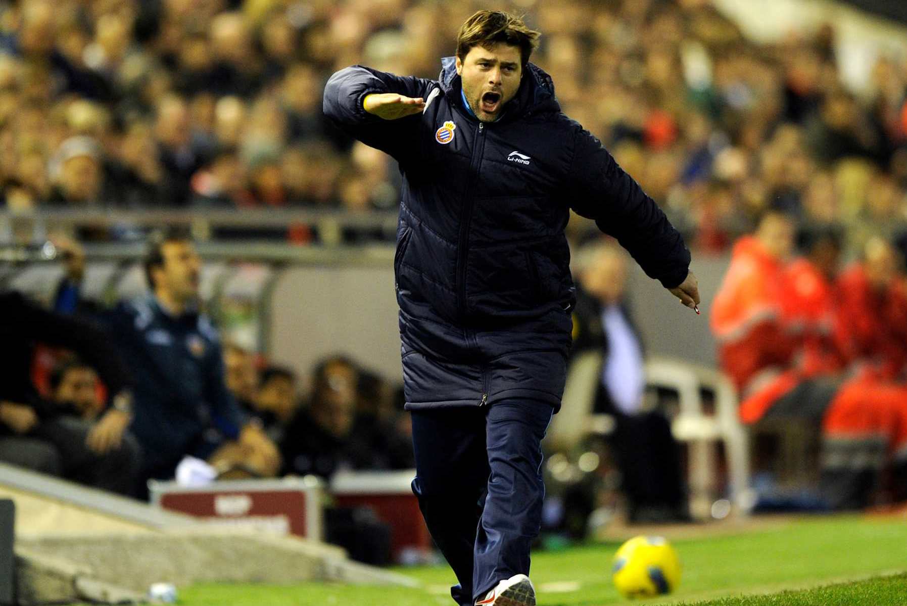 Espanyol's Argentinian coach Mauricio Pochettino reacts during the Spanish league football match Valencia CF vs Espanol on December 3, 2011 at the Mestalla stadium in Valencia. AFP PHOTO/ JOSE JORDAN (Photo credit should read JOSE JORDAN/AFP via Getty Images)
