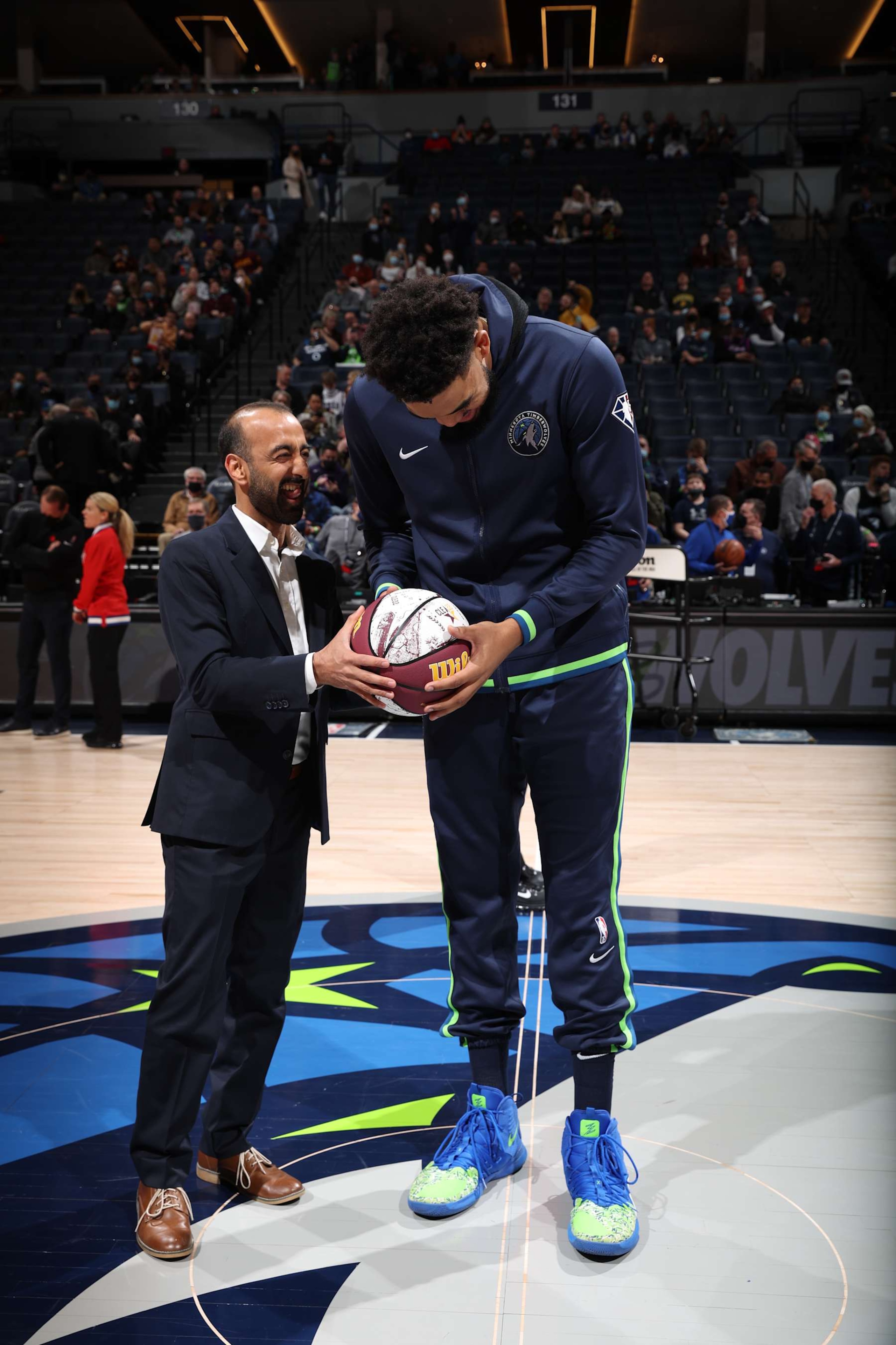 MINNEAPOLIS, MN -  FEBRUARY 16: Executive Vice President of Basketball Operations Sachin Gupta of the Minnesota Timberwolves presents Karl-Anthony Towns #32 of the Minnesota Timberwolves with his All Star ball before the game against the Toronto Raptors on February 16, 2022 at Target Center in Minneapolis, Minnesota. NOTE TO USER: User expressly acknowledges and agrees that, by downloading and or using this Photograph, user is consenting to the terms and conditions of the Getty Images License Agreement. Mandatory Copyright Notice: Copyright 2022 NBAE (Photo by David Sherman/NBAE via Getty Images)