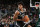 MILWAUKEE, WI - OCTOBER 12: Cam Thomas #24 of the Brooklyn Nets handles the ball during the game against the Milwaukee Bucks  on October 12, 2022 at the Fiserv Forum Center in Milwaukee, Wisconsin. NOTE TO USER: User expressly acknowledges and agrees that, by downloading and or using this Photograph, user is consenting to the terms and conditions of the Getty Images License Agreement. Mandatory Copyright Notice: Copyright 2022 NBAE (Photo by Gary Dineen/NBAE via Getty Images).