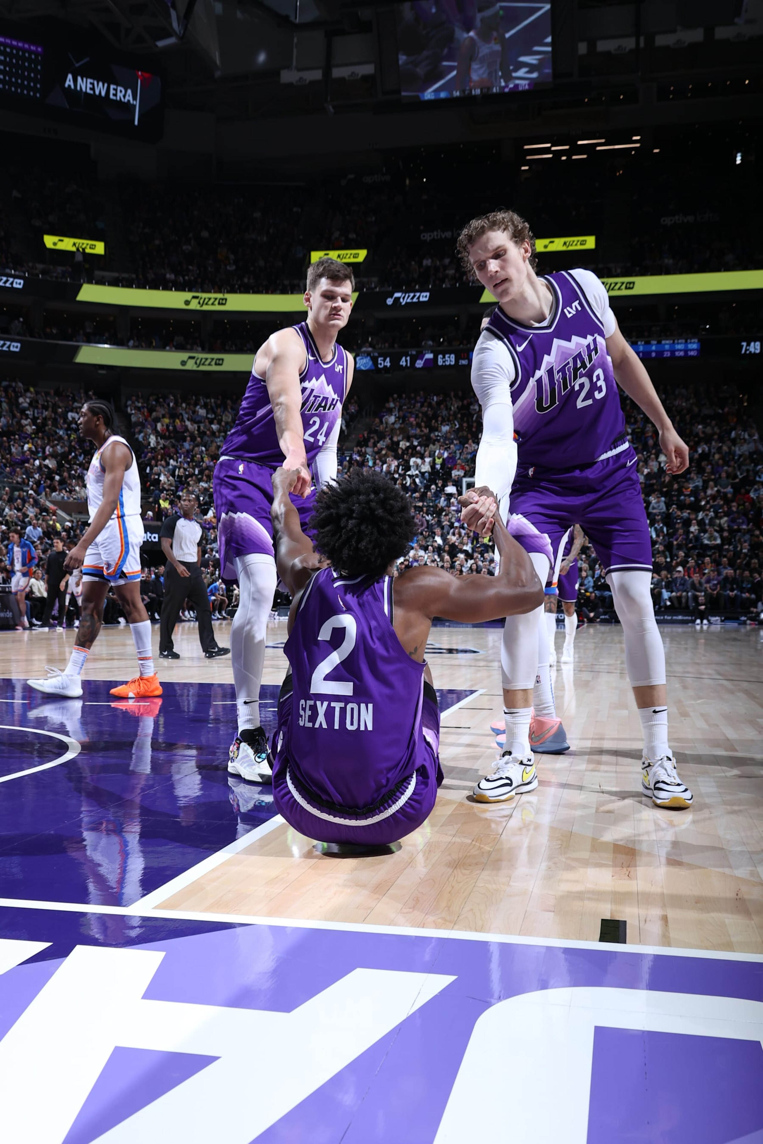 SALT LAKE CITY, UT - JANUARY 18: Colin Sexton #2 helped up by Walker Kessler #24 and Lauri Markkanen #23 of the Utah Jazz during the game against the Oklahoma City Thunder on January 18, 2024 at Delta Center in Salt Lake City, Utah. NOTE TO USER: User expressly acknowledges and agrees that, by downloading and or using this Photograph, User is consenting to the terms and conditions of the Getty Images License Agreement. Mandatory Copyright Notice: Copyright 2024 NBAE (Photo by Melissa Majchrzak/NBAE via Getty Images)