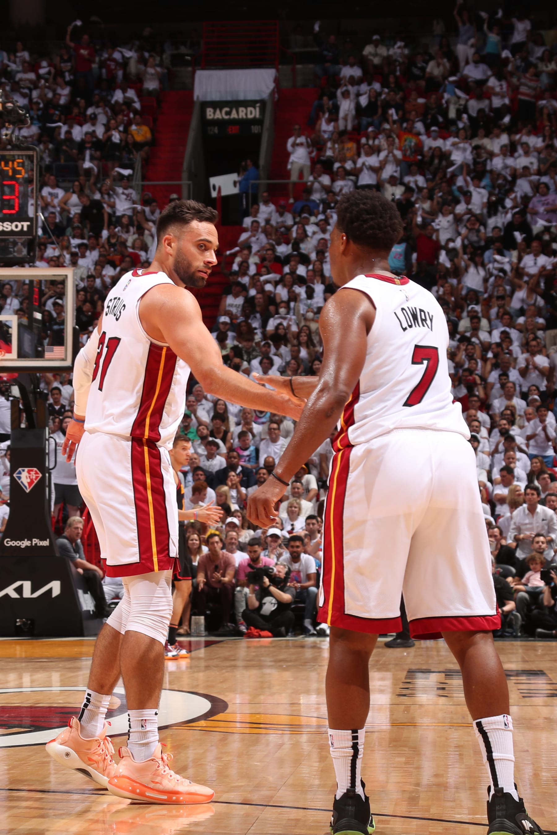 MIAMI, FL - APRIL 17: Max Strus #31 and Kyle Lowry #7 of the Miami Heat embrace during Round 1 Game 1 of the 2022 NBA Playoffs on April 17, 2022 at FTX Arena in Miami, Florida. NOTE TO USER: User expressly acknowledges and agrees that, by downloading and or using this Photograph, user is consenting to the terms and conditions of the Getty Images License Agreement. Mandatory Copyright Notice: Copyright 2022 NBAE (Photo by Issac Baldizon/NBAE via Getty Images)