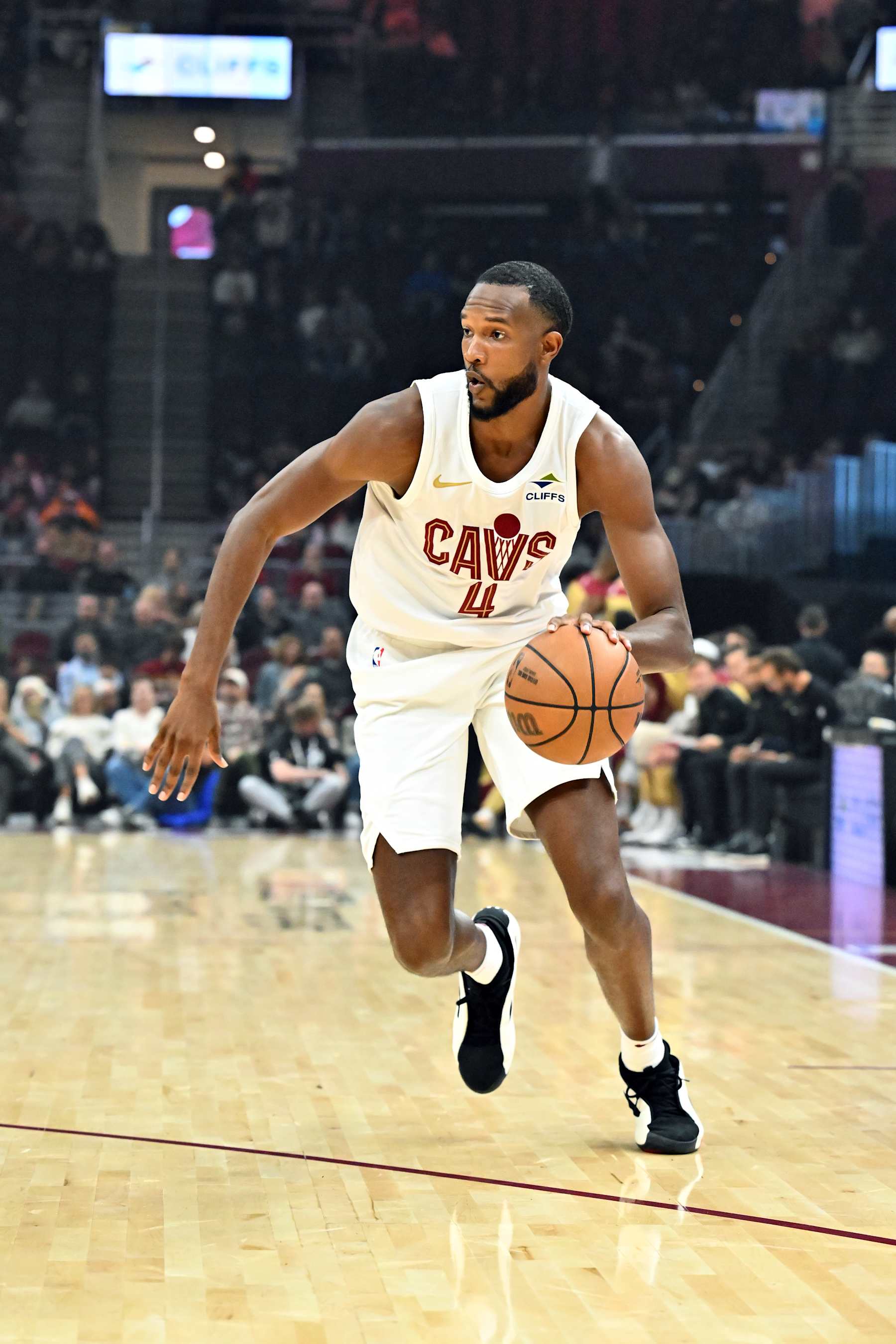 CLEVELAND, OHIO - OCTOBER 08: Evan Mobley #4 of the Cleveland Cavaliers drives to the basket during the first half of a preseason game against the Chicago Bulls at Rocket Mortgage Fieldhouse on October 08, 2024 in Cleveland, Ohio. NOTE TO USER: User expressly acknowledges and agrees that, by downloading and or using this photograph, User is consenting to the terms and conditions of the Getty Images License Agreement. (Photo by Jason Miller/Getty Images)