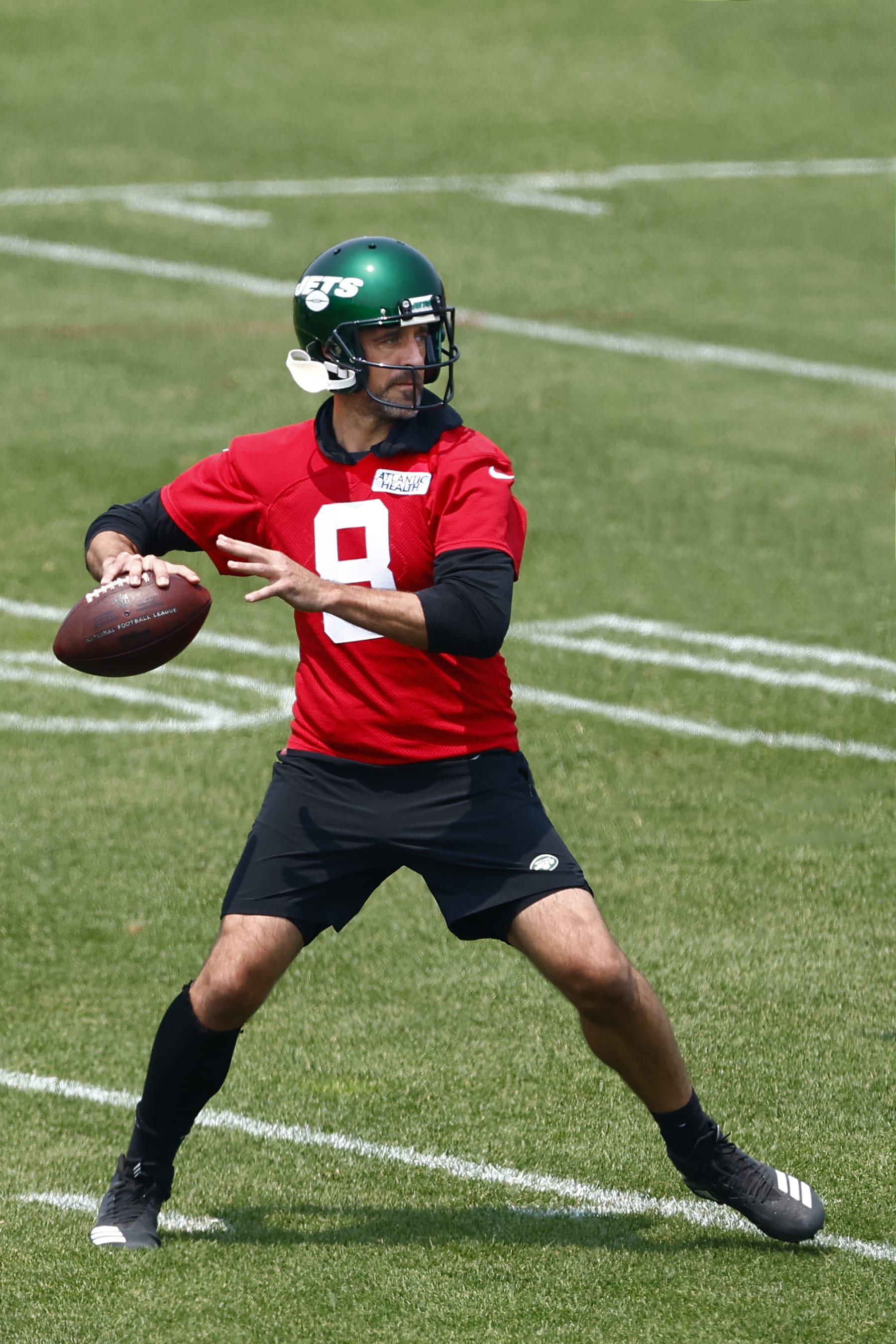 FLORHAM PARK, NEW JERSEY - JUNE 6: Quarterback Aaron Rodgers #8 of the New York Jets attempts a pass during the teams OTAs at Atlantic Health Jets Training Center on June 6, 2023 in Florham Park, New Jersey. (Photo by Rich Schultz/Getty Images)