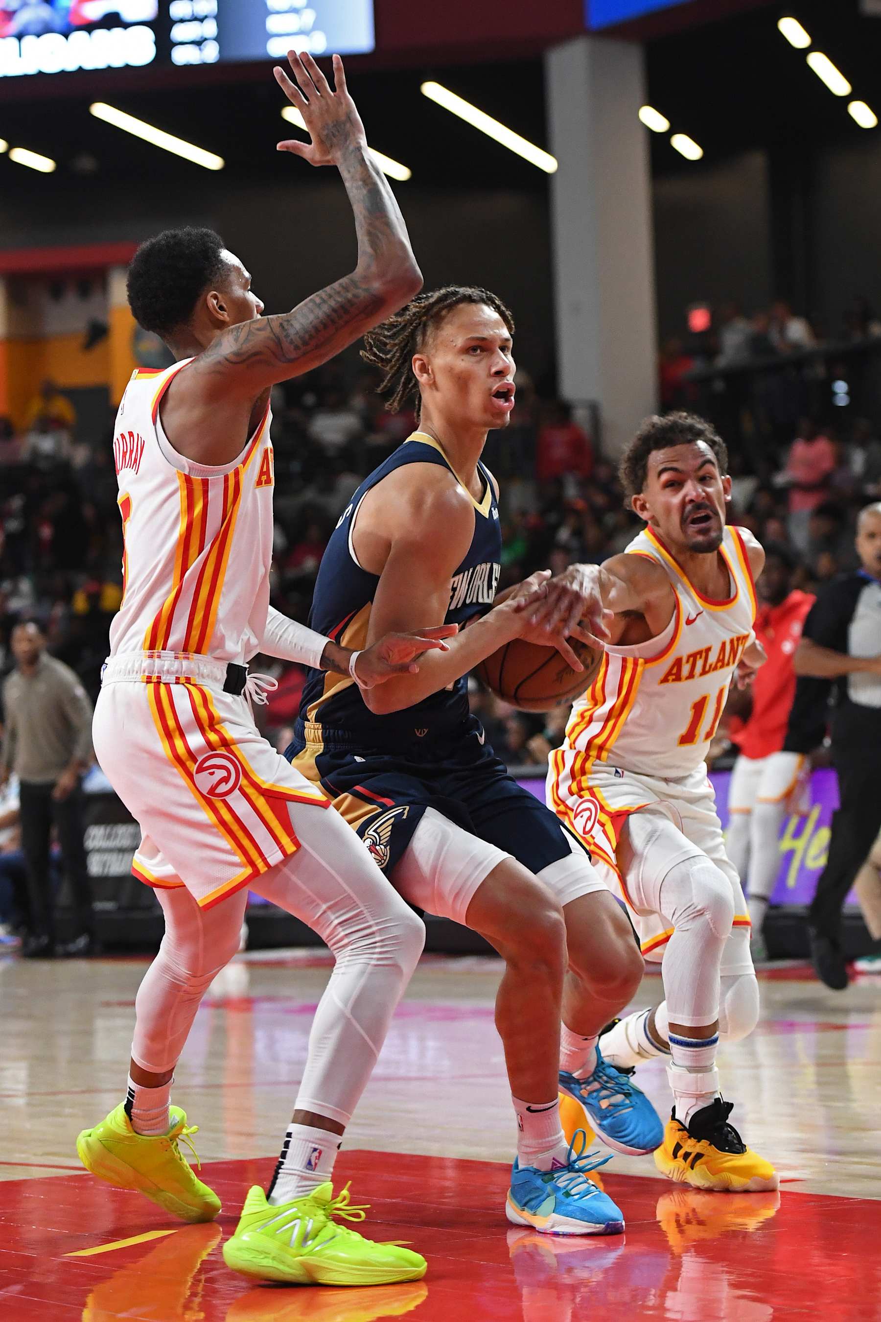 COLLEGE PARK, GA - OCTOBER 14: Dyson Daniels #11 of the New Orleans Pelicans drives to the basket during the game against the Atlanta Hawks on October 14, 2023 at Gateway Center Arena in College Park, Georgia.  NOTE TO USER: User expressly acknowledges and agrees that, by downloading and/or using this Photograph, user is consenting to the terms and conditions of the Getty Images License Agreement. Mandatory Copyright Notice: Copyright 2023 NBAE (Photo by Scott Cunningham/NBAE via Getty Images)