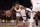 LOS ANGELES, CALIFORNIA - JANUARY 05: Ja Morant #12 of the Memphis Grizzlies dribbles away from a screen set by Luke Kennard #10 on Jarred Vanderbilt #2 of the Los Angeles Lakers during a 127-113 Grizzlies win over the Los Angeles Lakers at Crypto.com Arena on January 05, 2024 in Los Angeles, California. User is consenting to the terms and conditions of the Getty Images License Agreement. (Photo by Harry How/Getty Images)