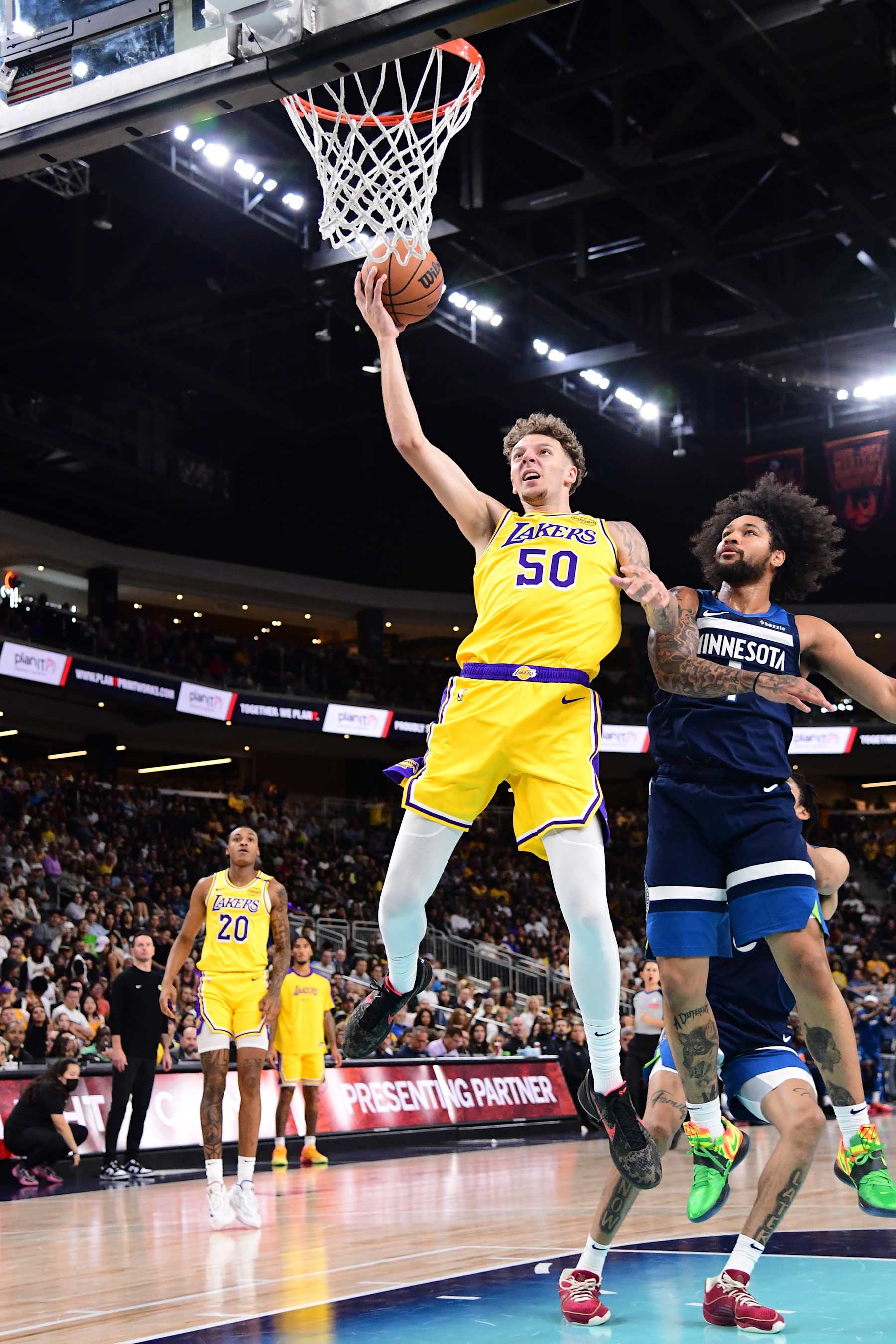 PALM SPRINGS, CA - OCTOBER 4: Kylor Kelley #50 of the Los Angeles Lakers drives to the basket during the game against the Minnesota Timberwolves during an NBA preseason game on October 4, 2024 at Acrisure Arena in Palm Springs, California. NOTE TO USER: User expressly acknowledges and agrees that, by downloading and/or using this Photograph, user is consenting to the terms and conditions of the Getty Images License Agreement. Mandatory Copyright Notice: Copyright 2024 NBAE (Photo by Adam Pantozzi/NBAE via Getty Images)