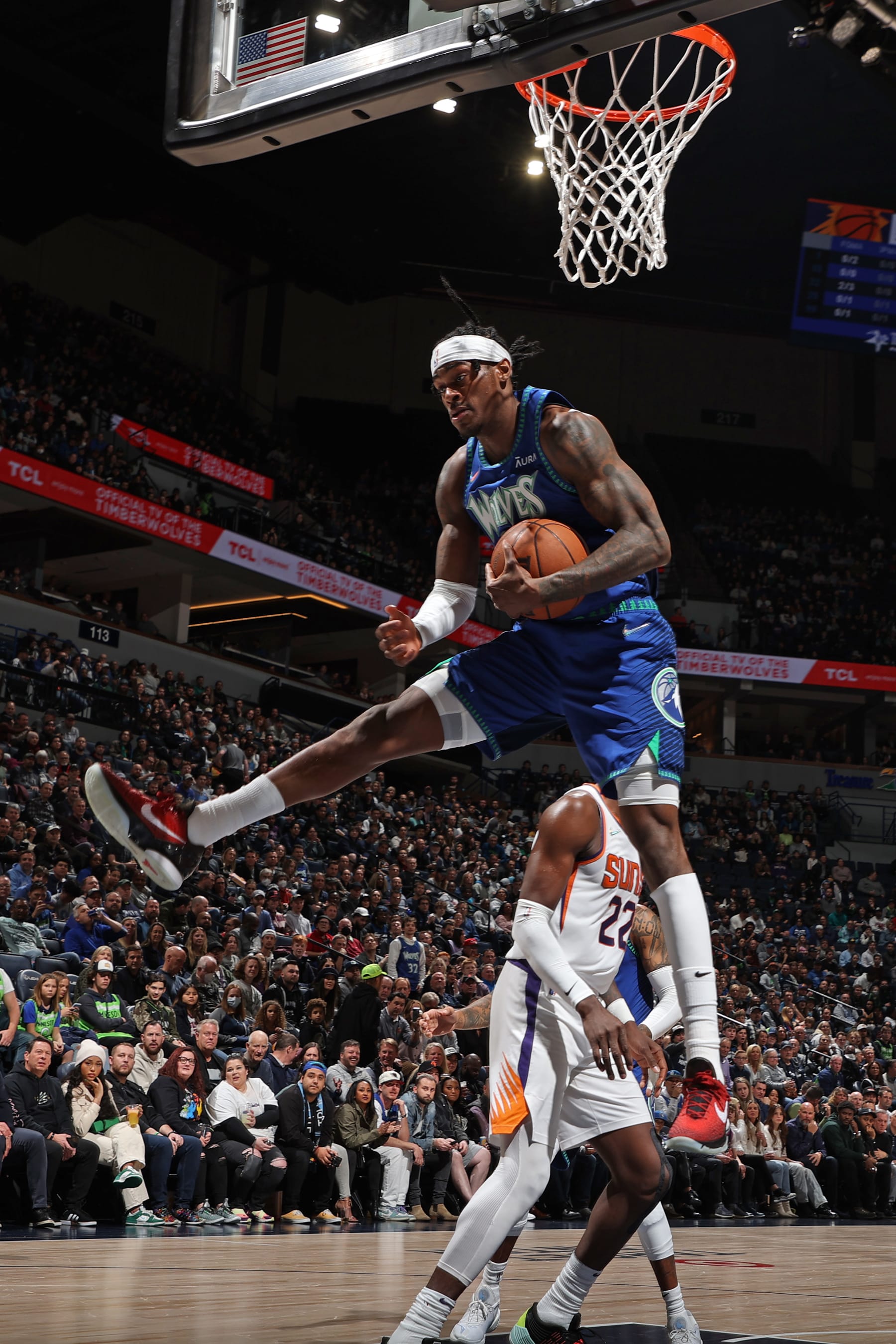 MINNEAPOLIS, MN - MARCH 23: Jarred Vanderbilt #8 of the Minnesota Timberwolves rebounds the ball during the game against the Phoenix Suns on March 23, 2022 at Target Center in Minneapolis, Minnesota. NOTE TO USER: User expressly acknowledges and agrees that, by downloading and or using this Photograph, user is consenting to the terms and conditions of the Getty Images License Agreement. Mandatory Copyright Notice: Copyright 2022 NBAE (Photo by David Sherman/NBAE via Getty Images)