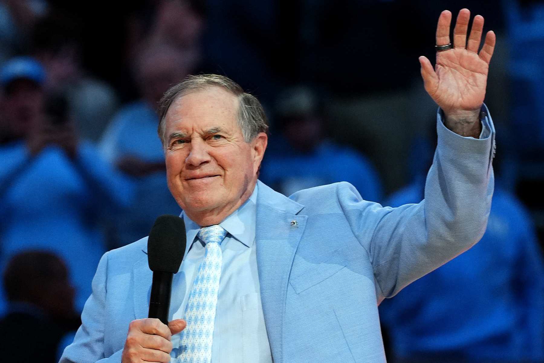 CHAPEL HILL, NORTH CAROLINA - DECEMBER 14: Head coach Bill Belichick of the North Carolina Tar Heels addresses the crowd during halftime in the game against the La Salle Explorers at the Dean E. Smith Center on December 14, 2024 in Greensboro, North Carolina. (Photo by Grant Halverson/Getty Images)