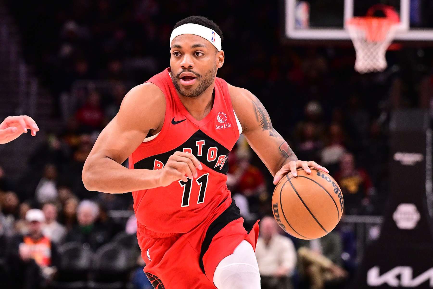 ATLANTA, GA - JANUARY 23:  Bruce Brown #11 of the Toronto Raptors dribbles the ball during the game against the Atlanta Hawks on January 23, 2025 at State Farm Arena in Atlanta, Georgia.  NOTE TO USER: User expressly acknowledges and agrees that, by downloading and/or using this Photograph, user is consenting to the terms and conditions of the Getty Images License Agreement. Mandatory Copyright Notice: Copyright 2025 NBAE (Photo by Adam Hagy/NBAE via Getty Images)