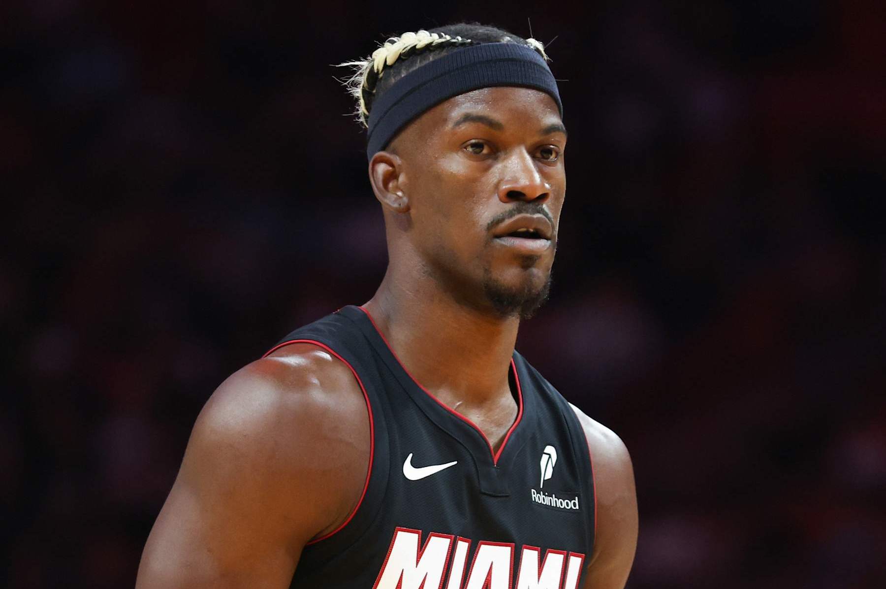 MIAMI, FLORIDA - JANUARY 19: Jimmy Butler #22 of the Miami Heat looks on against the San Antonio Spurs during the first quarter of the game at Kaseya Center on January 19, 2025 in Miami, Florida. NOTE TO USER: User expressly acknowledges and agrees that, by downloading and or using this photograph, User is consenting to the terms and conditions of the Getty Images License Agreement. (Photo by Megan Briggs/Getty Images)