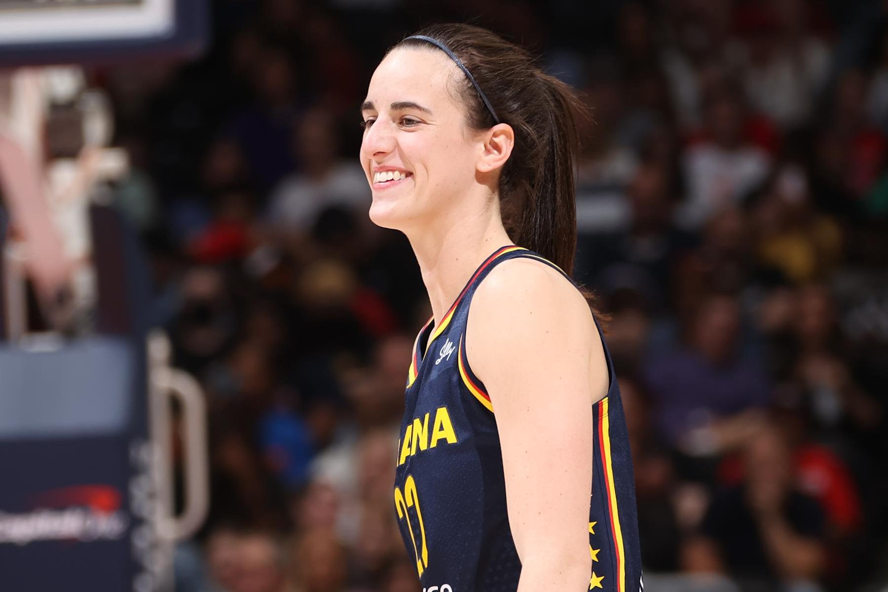 WASHINGTON, D.C. - SEPTEMBER 19: Caitlin Clark #22 of the Indiana Fever smiles during the game against the Washington Mystics on September 19, 2024 at Entertainment and Sports Arena in Washington, D.C. NOTE TO USER: User expressly acknowledges and agrees that, by downloading and or using this photograph, User is consenting to the terms and conditions of the Getty Images License Agreement. Mandatory Copyright Notice: Copyright 2024 NBAE (Photo by Kenny Giarla/NBAE via Getty Images)