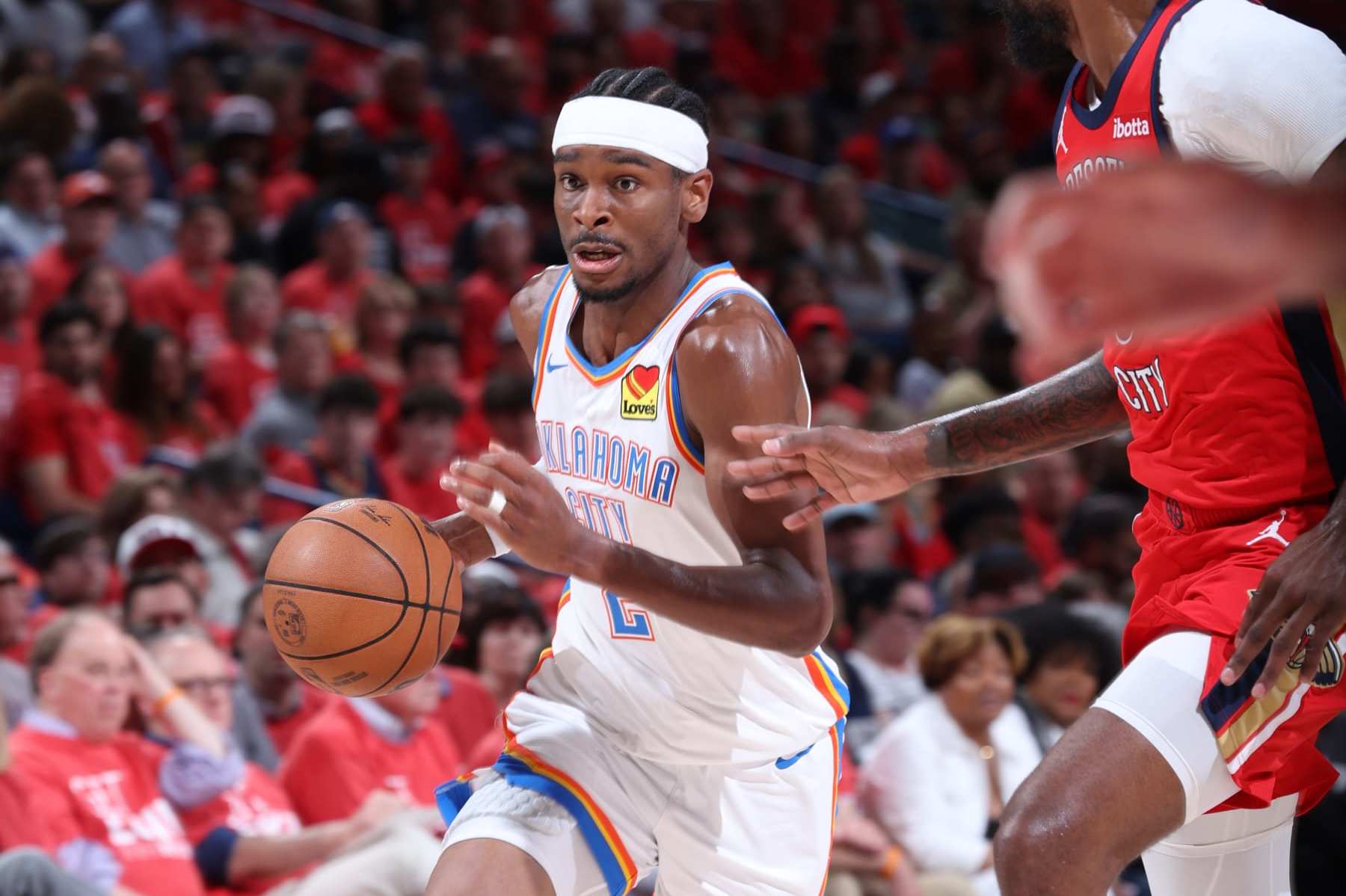 NEW ORLEANS, LA - APRIL 27:  Shai Gilgeous-Alexander #2 of the Oklahoma City Thunder handles the ball during the game against the New Orleans Pelicans during Round 1 Game 3 of the 2024 NBA Playoffs on April 27, 2024 at the Smoothie King Center in New Orleans, Louisiana. NOTE TO USER: User expressly acknowledges and agrees that, by downloading and or using this Photograph, user is consenting to the terms and conditions of the Getty Images License Agreement. Mandatory Copyright Notice: Copyright 2024 NBAE (Photo by Jeff Haynes/NBAE via Getty Images)