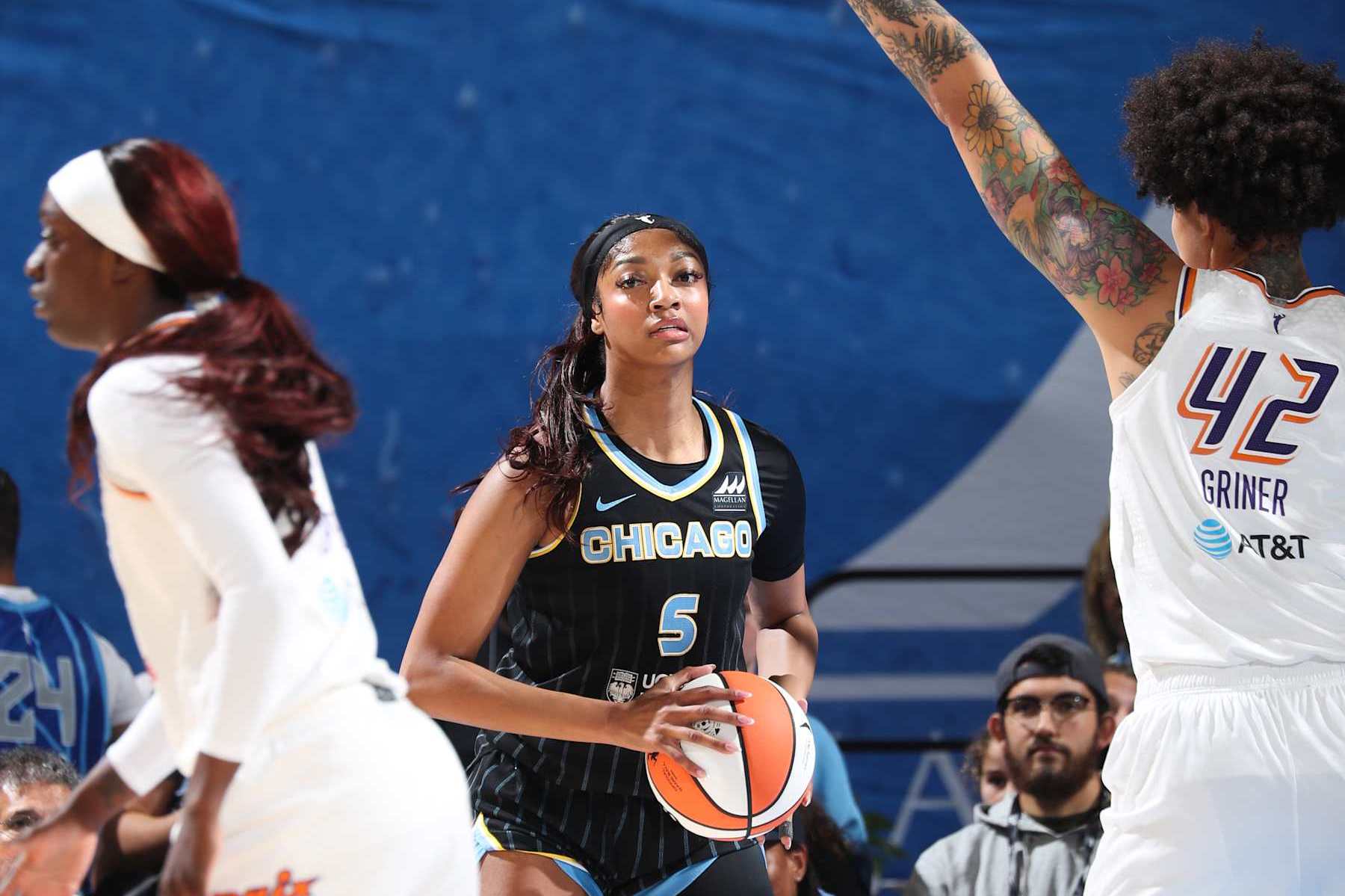CHICAGO, IL -  AUGUST 15: Angel Reese #5 of the Chicago Sky handles the ball during the game against the Phoenix Mercury on August 15, 2024 at the Wintrust Arena in Chicago, IL. NOTE TO USER: User expressly acknowledges and agrees that, by downloading and or using this photograph, User is consenting to the terms and conditions of the Getty Images License Agreement. Mandatory Copyright Notice: Copyright 2024 NBAE (Photo by Gary Dineen/NBAE via Getty Images)