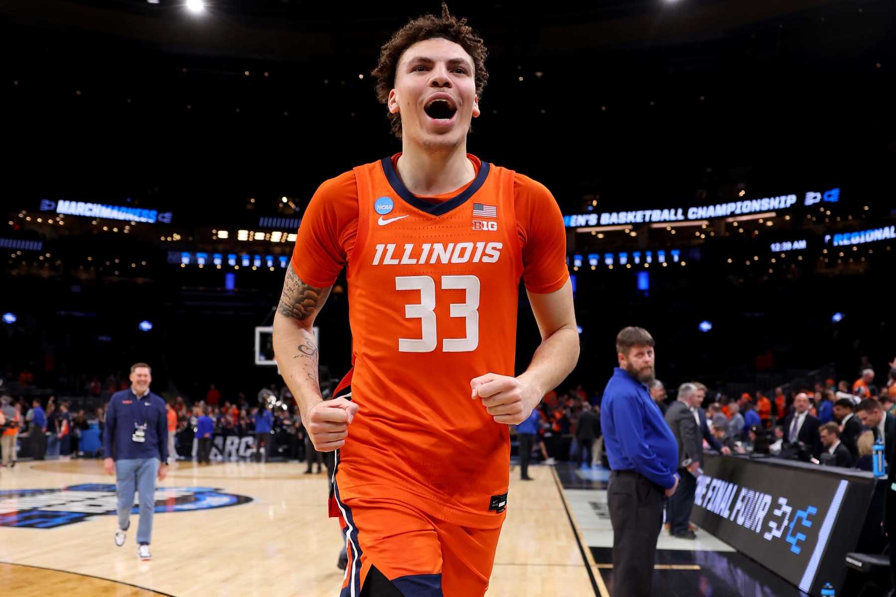 BOSTON, MASSACHUSETTS - MARCH 28: Coleman Hawkins #33 of the Illinois Fighting Illini celebrates after defeating the Iowa State Cyclones in the Sweet 16 round of the NCAA Men's Basketball Tournament at TD Garden on March 28, 2024 in Boston, Massachusetts. (Photo by Michael Reaves/Getty Images)