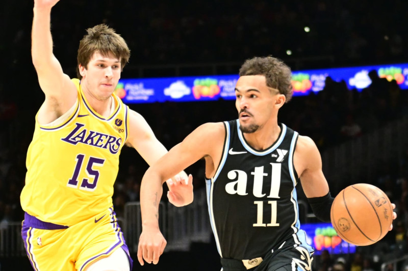 ATLANTA, GA - JANUARY 30: Trae Young #11 of the Atlanta Hawks handles the ball during the game against the Los Angeles Lakers on January 30, 2024 at State Farm Arena in Atlanta, Georgia. NOTE TO USER: User expressly acknowledges and agrees that, by downloading and/or using this Photograph, user is consenting to the terms and conditions of the Getty Images License Agreement. Mandatory Copyright Notice: Copyright 2024 NBAE (Photo by Adam Hagy/NBAE via Getty Images)