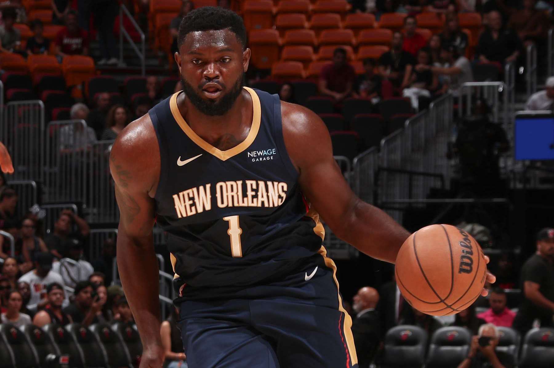 MIAMI, FL - OCTOBER 13: Zion Williamson #1 of the New Orleans Pelicans dribbles the ball during the game against the Miami Heat during a NBA pre season game on October 13, 2024 at Kaseya Center in Miami, Florida. NOTE TO USER: User expressly acknowledges and agrees that, by downloading and or using this Photograph, user is consenting to the terms and conditions of the Getty Images License Agreement. Mandatory Copyright Notice: Copyright 2024 NBAE (Photo by Issac Baldizon/NBAE via Getty Images)