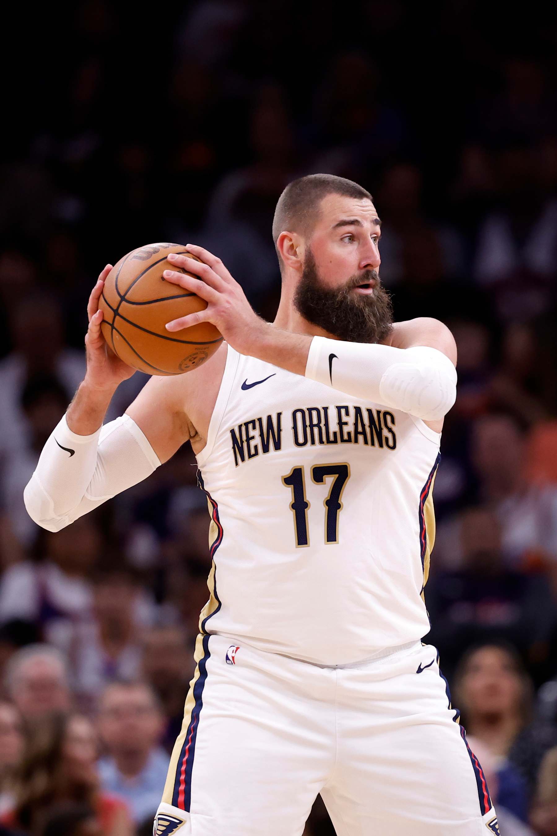 PHOENIX, ARIZONA - APRIL 07: Jonas Valanciunas #17 of the New Orleans Pelicans controls the ball during the game against the Phoenix Suns at Footprint Center on April 07, 2024 in Phoenix, Arizona. The Pelicans defeated the Suns 113-105. NOTE TO USER: User expressly acknowledges and agrees that, by downloading and or using this photograph, User is consenting to the terms and conditions of the Getty Images License Agreement.  (Photo by Chris Coduto/Getty Images)