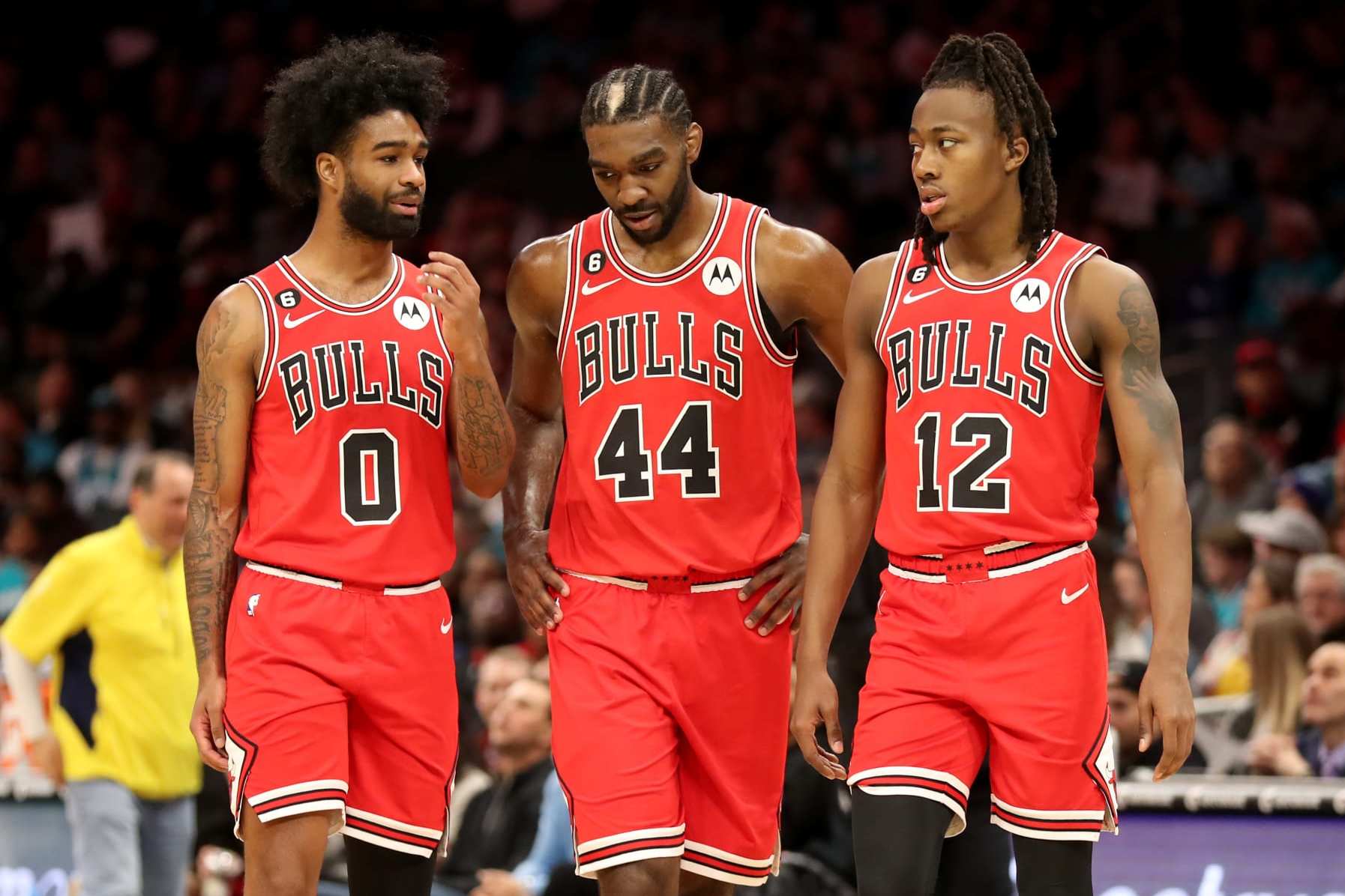 CHARLOTTE, NC - JANUARY 26: Coby White #0 talks with Patrick Williams #44 and Ayo Dosunmu #12 of the Chicago Bulls during the game against the Charlotte Hornets on January 26, 2023 at Spectrum Center in Charlotte, North Carolina. NOTE TO USER: User expressly acknowledges and agrees that, by downloading and or using this photograph, User is consenting to the terms and conditions of the Getty Images License Agreement. Mandatory Copyright Notice: Copyright 2023 NBAE (Photo by Brock Williams-Smith/NBAE via Getty Images)